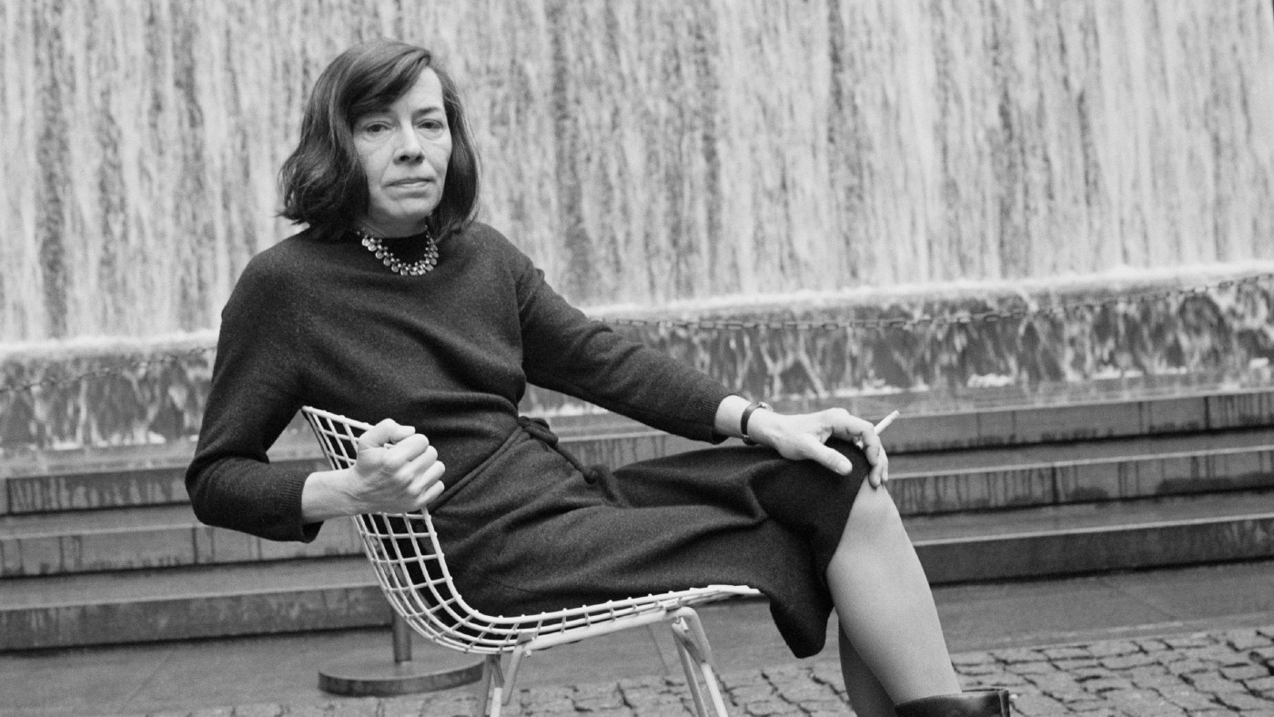 Patricia Highsmith posing for a photo