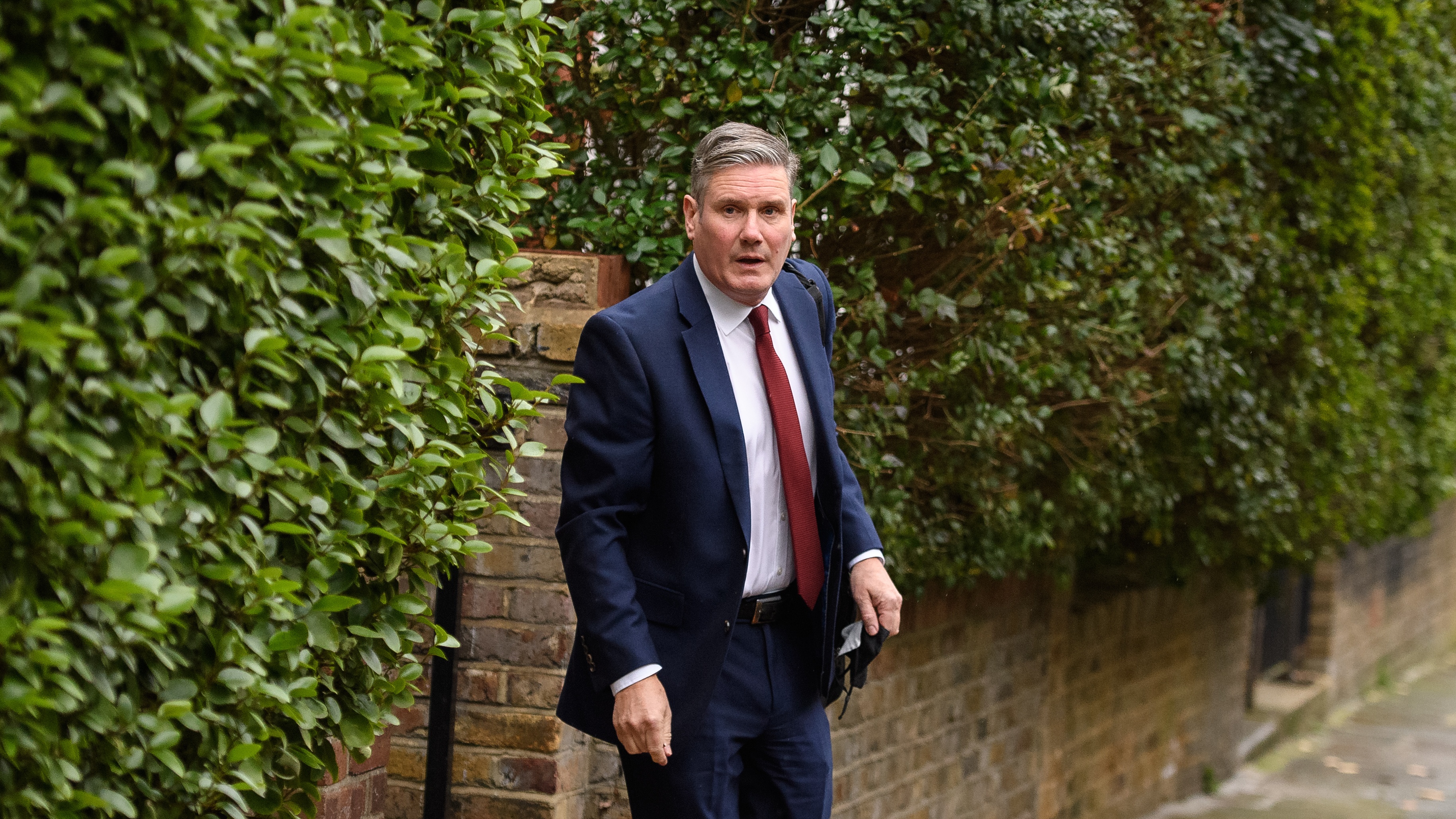Keir Starmer outside his home in London