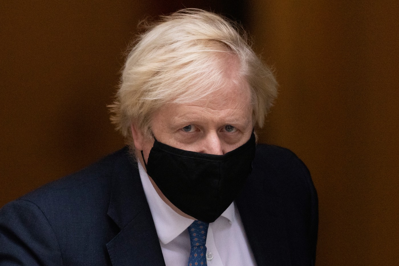Boris Johnson wearing a mask