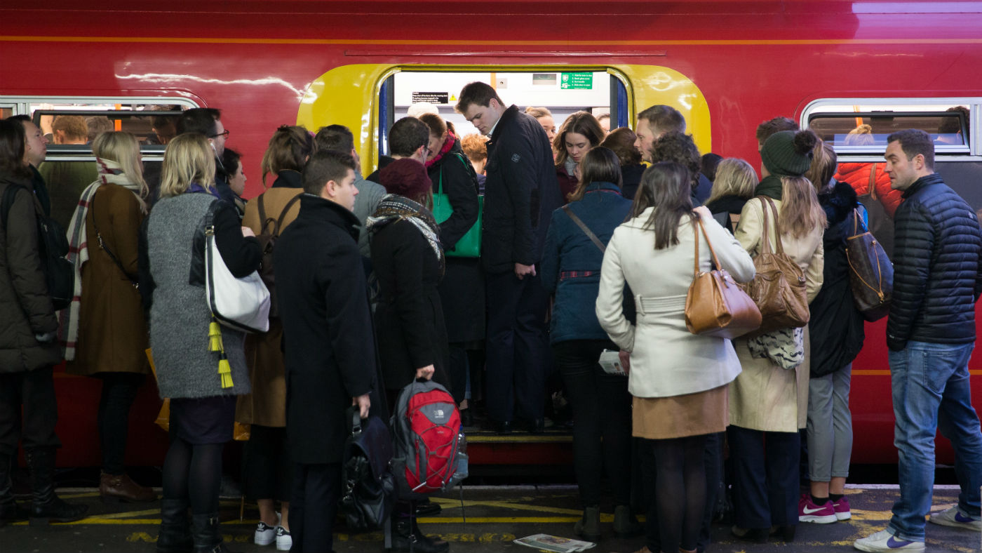 Commuters wrestle for space at Clapham Junction