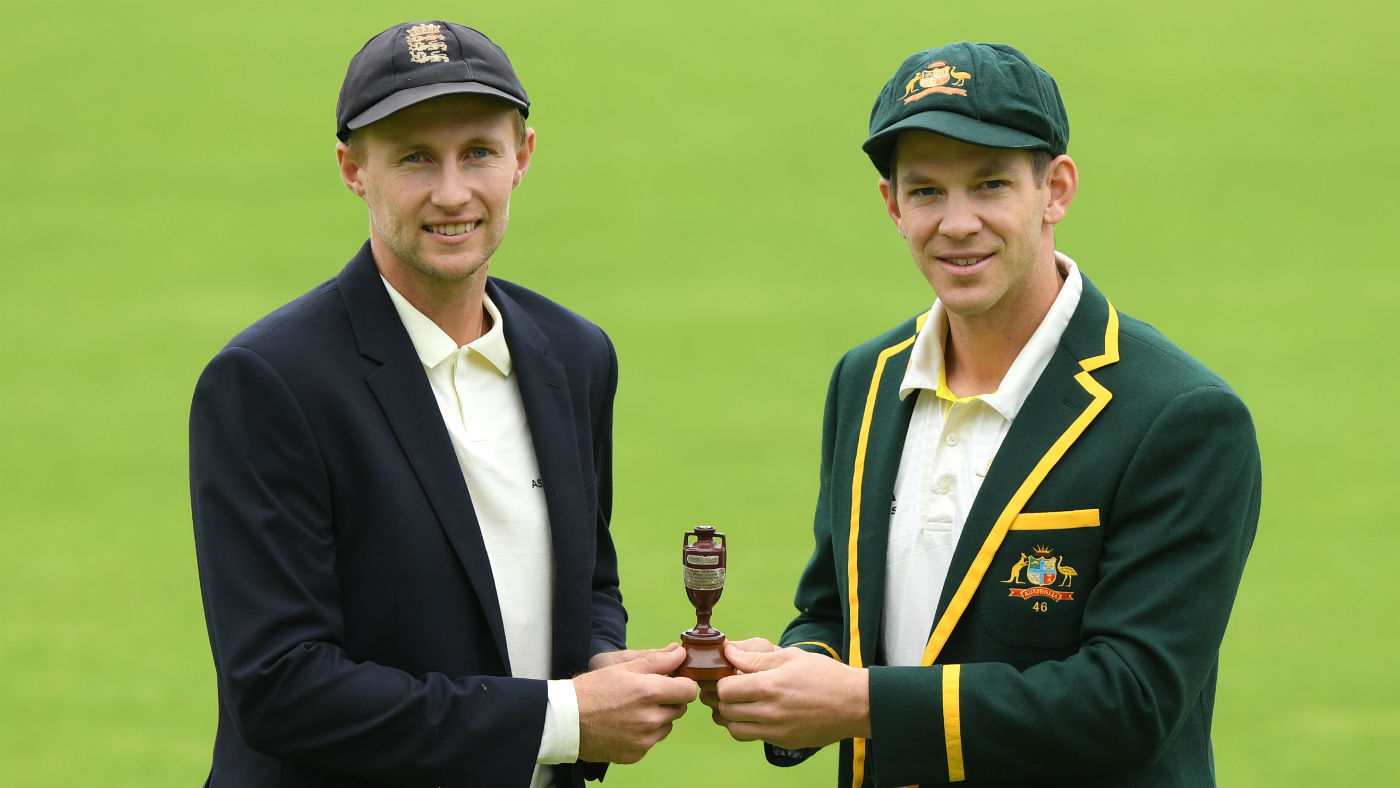 England captain Joe Root and Australia skipper Tim Paine hold the urn ahead of the Ashes