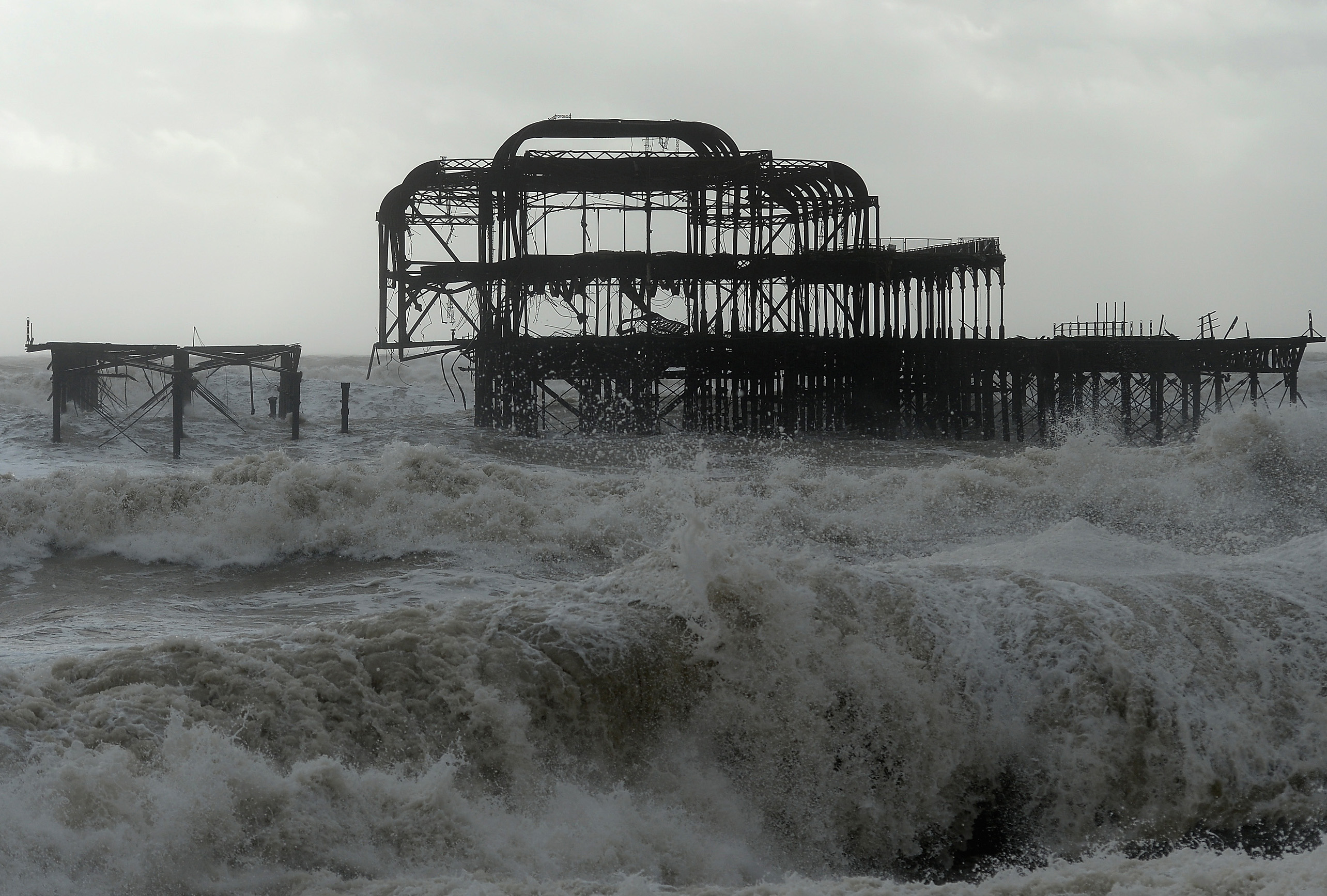 BRIGHTON, UNITED KINGDOM - FEBRUARY 05:A large section of Brighton&#039;s dilapidated West Pier has been washed away in the latest storm on February 5, 2014 in Brighton, United Kingdom. With high 