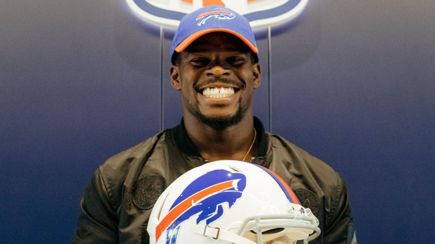 Ex-rugby star Christian Wade poses with a Buffalo Bills helmet