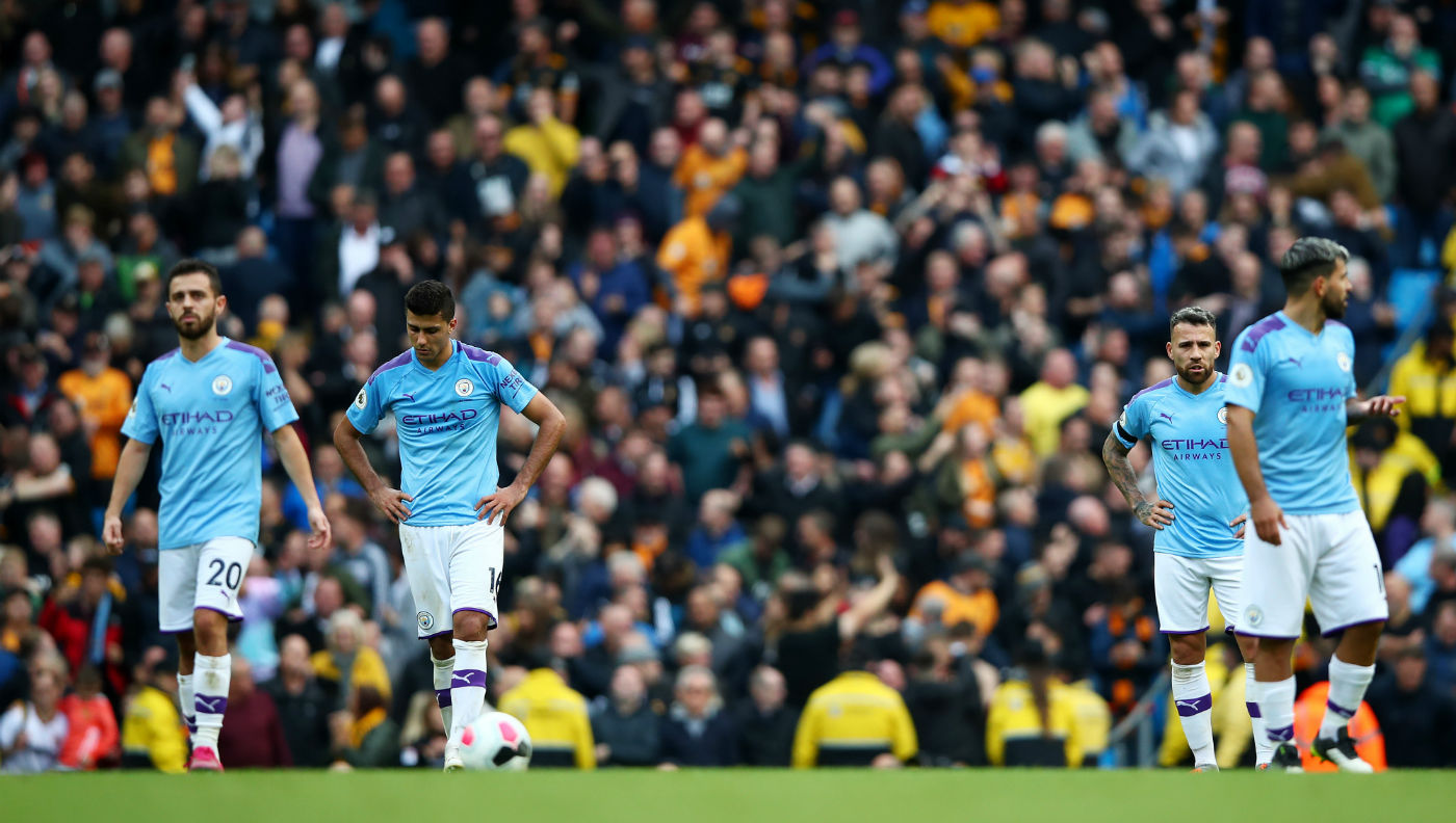 Manchester City players look dejected during the 2-0 loss against Wolves in the Premier League 