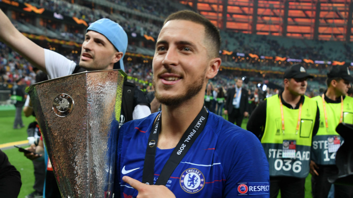 Chelsea’s Eden Hazard holds the Europa League trophy after the 4-1 win over Arsenal in Baku