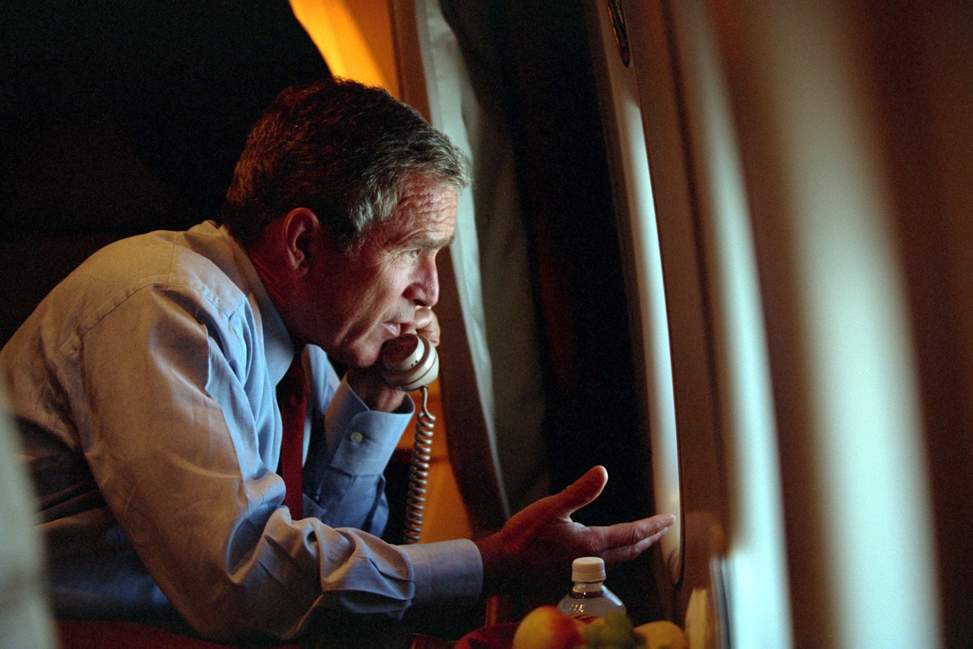 George W. Bush speaks to Vice President Dick Cheney on board Air Force One