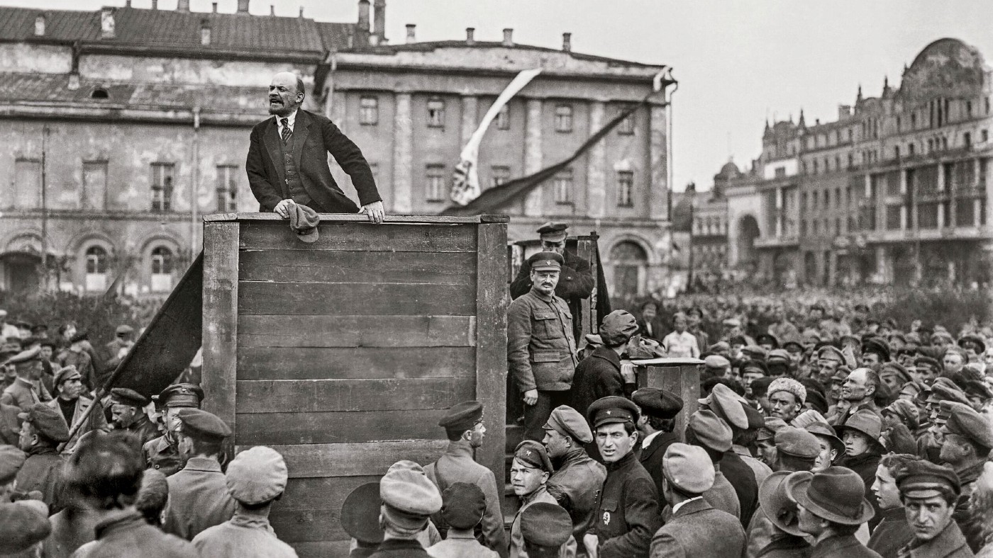 Black and white photo showing Vladimir Lenin on a podium