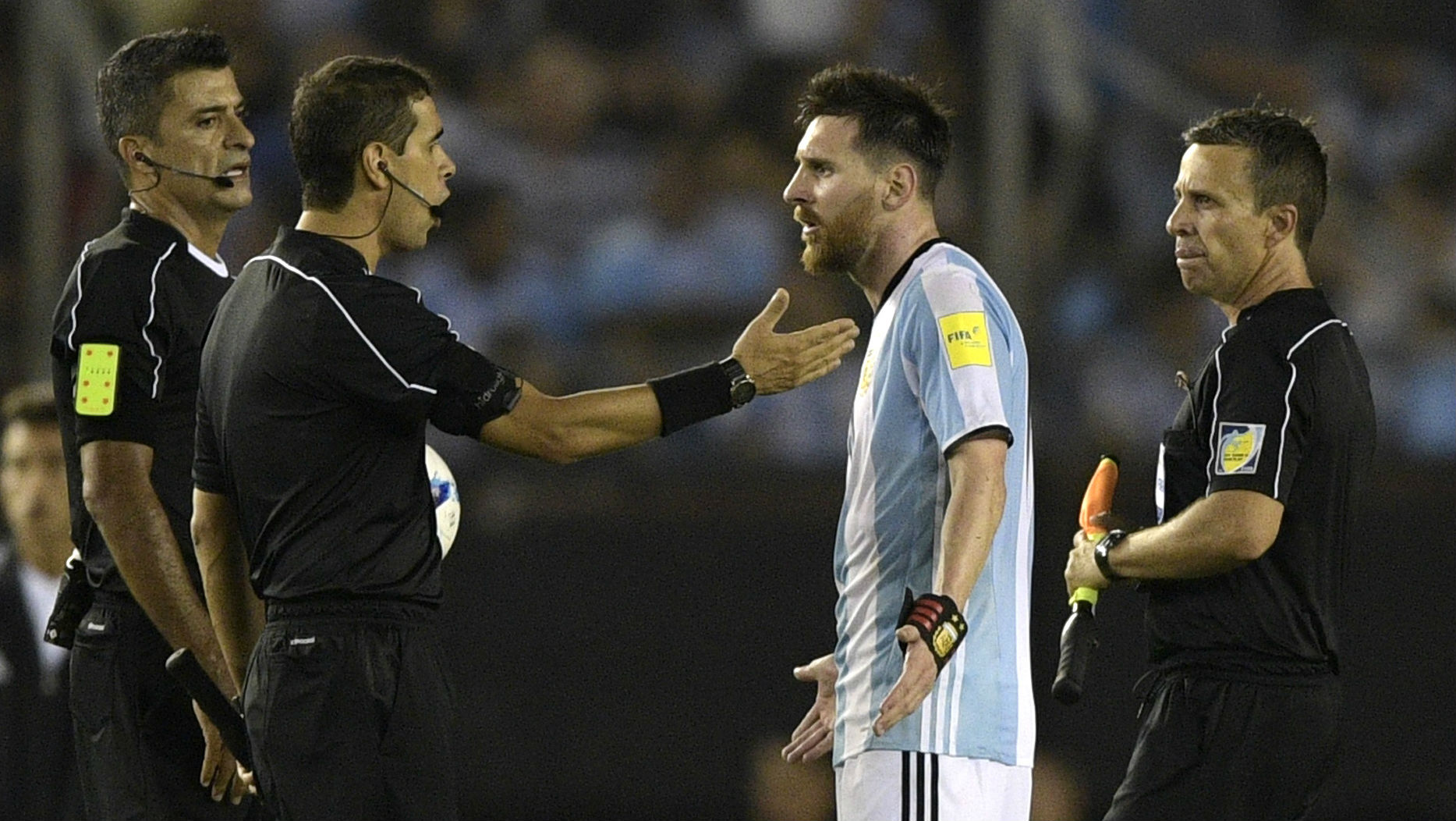 Lionel Messi; Argentina; argues with referee 