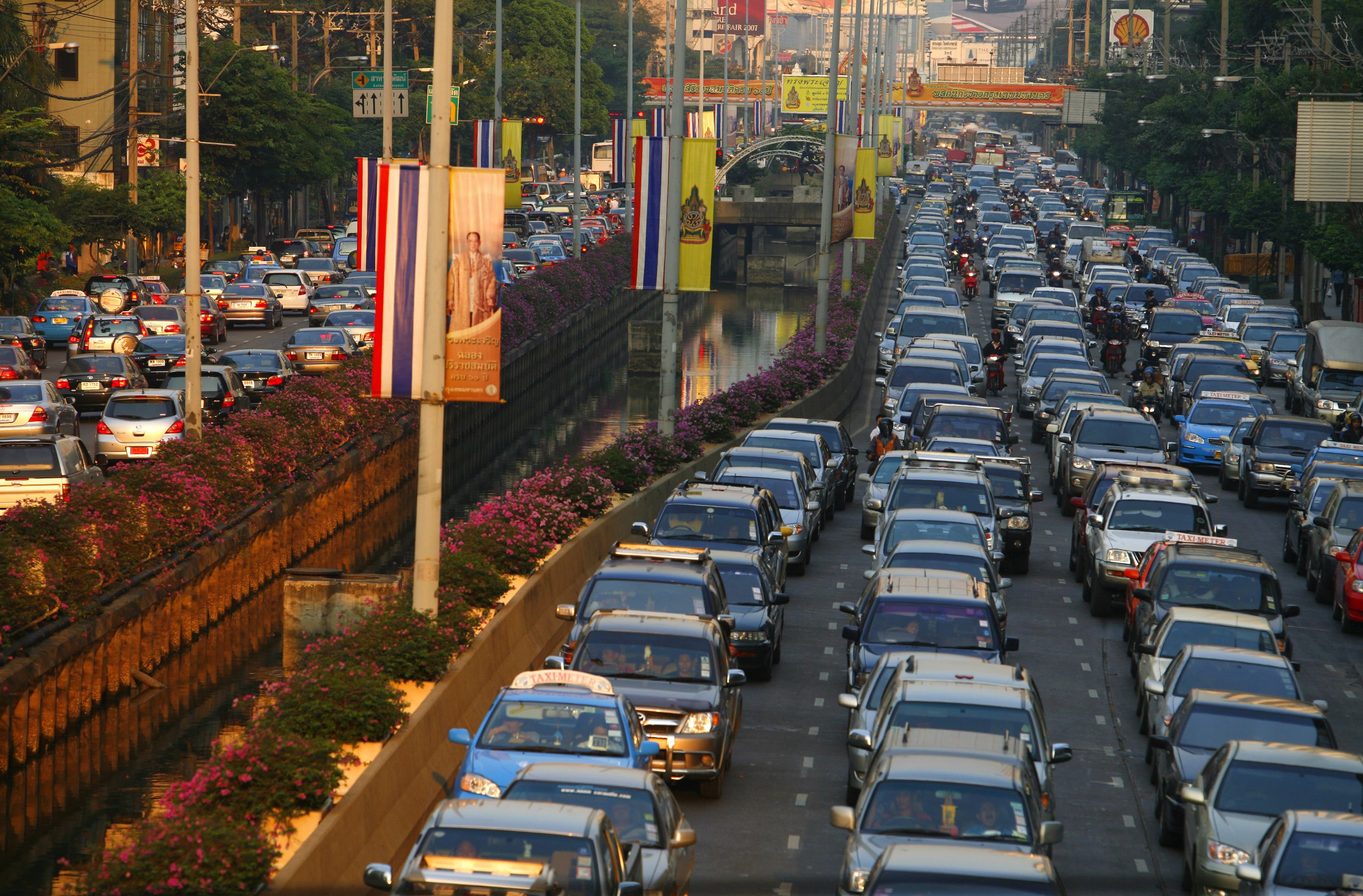 BANGKOK-THAILAND - JANUARY 25: Cars move slowly during rush hour traffic January 25, 2006 in Bangkok, Thailand. According to reports Bangkok estimates that it loses 6 percent of its economic 