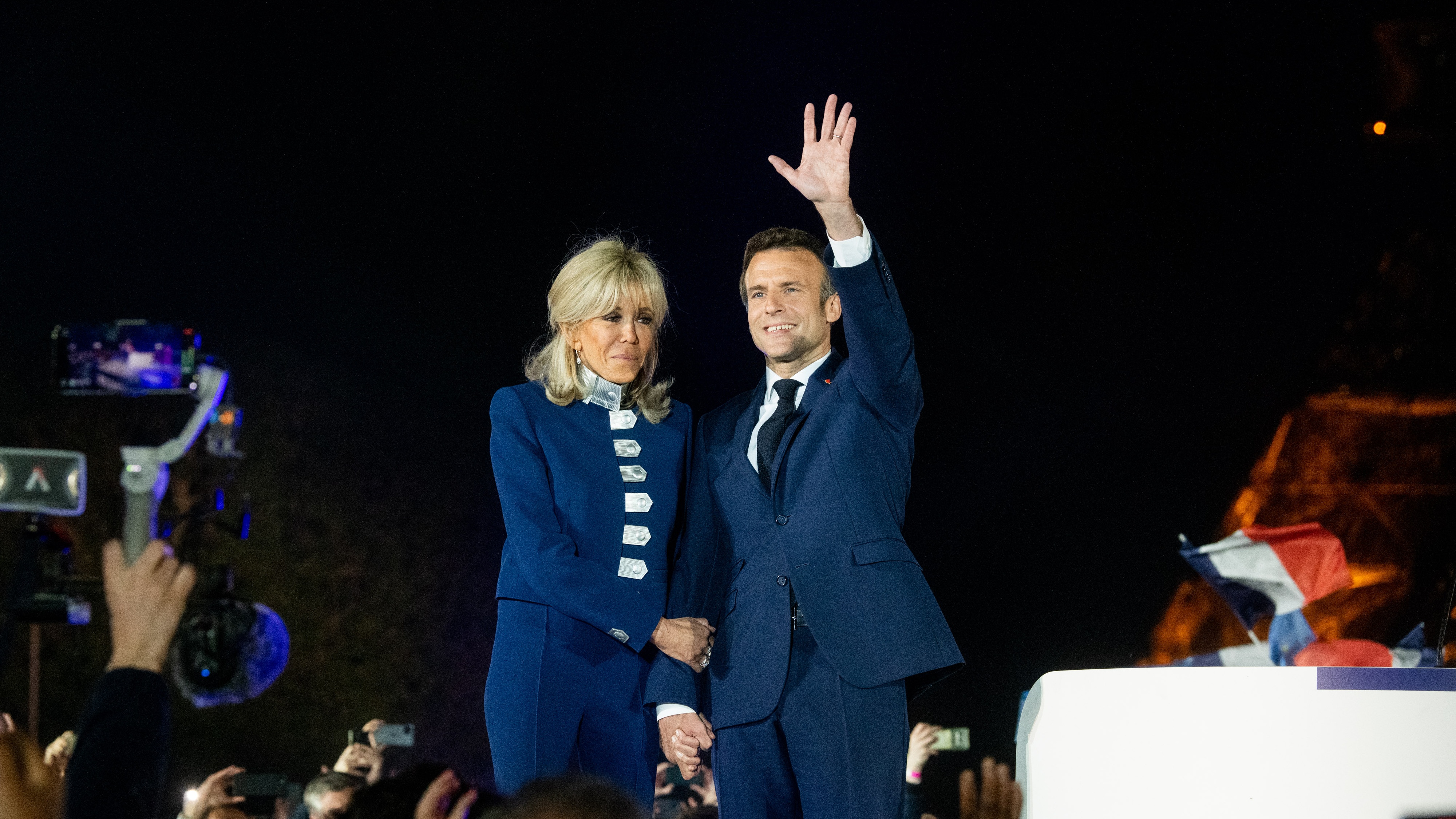 Emmanuel Macron and his wife, Brigitte, celebrate his victory in Paris
