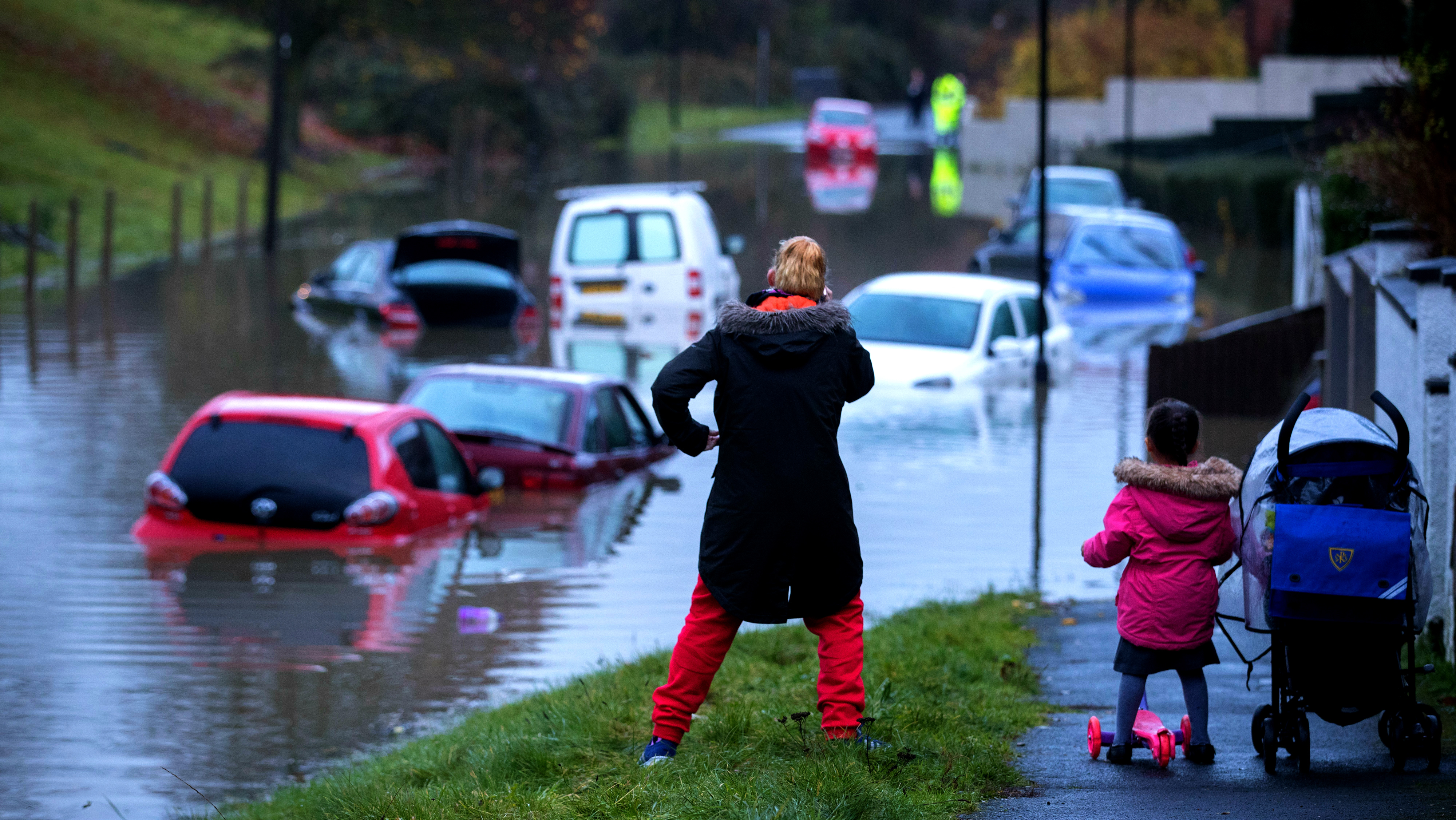 Cars bob beneath the flood water in Hartcliffe, near Bristol, after heavy rainfall from Storm Angus