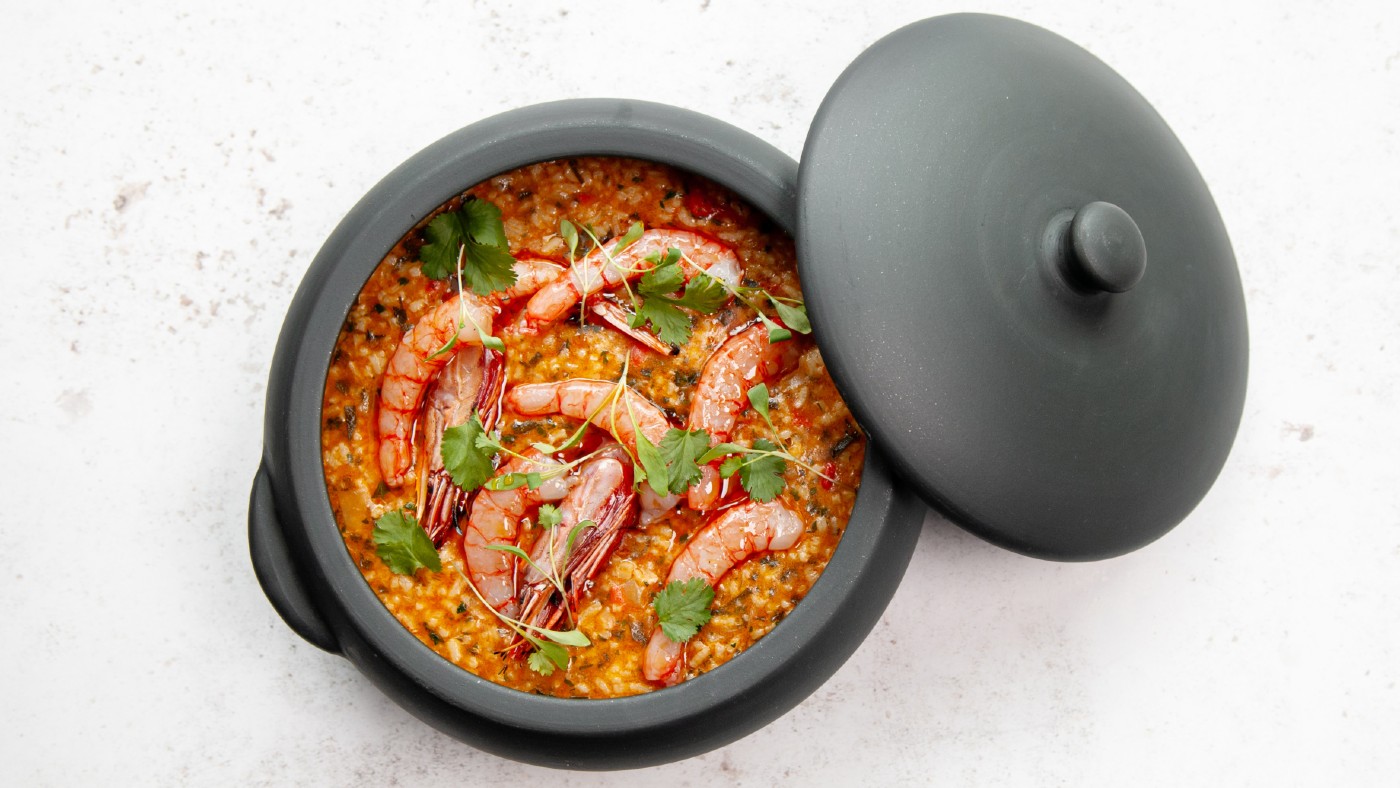 A red prawn and seafood rice dish
