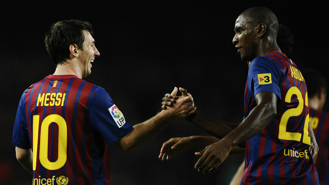 Lionel Messi and Eric Abidal were formerly team-mates at Barcelona 