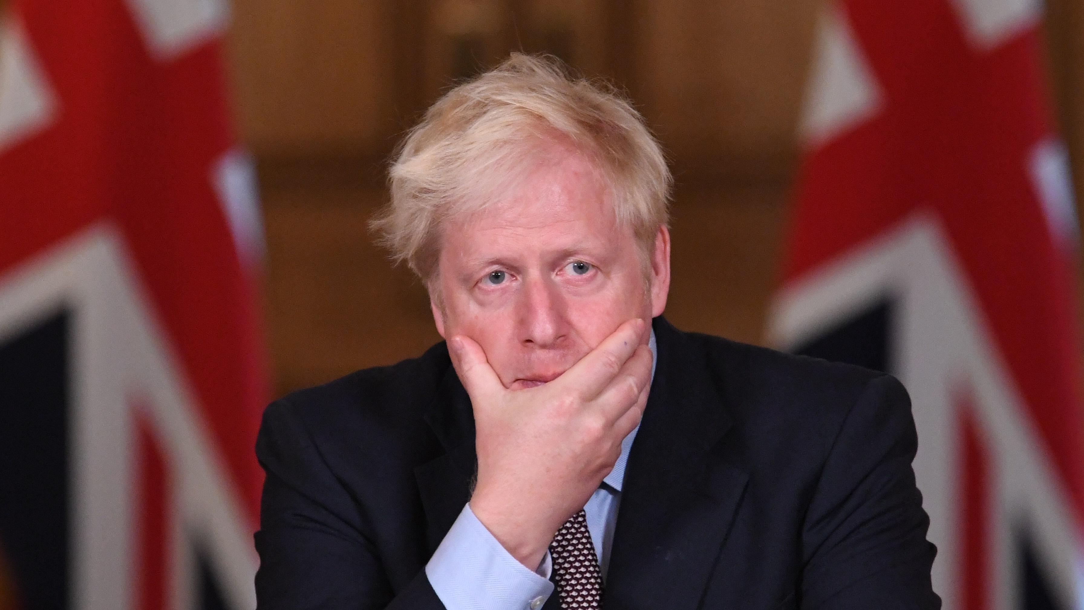 Boris Johnson attends a virtual press conference