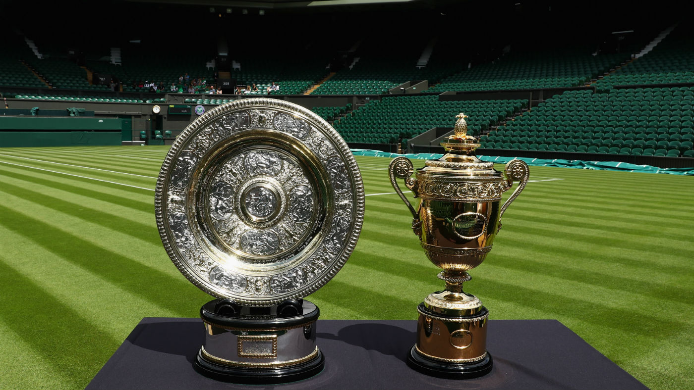 The Wimbledon women’s and men’s singles trophies on display at Centre Court
