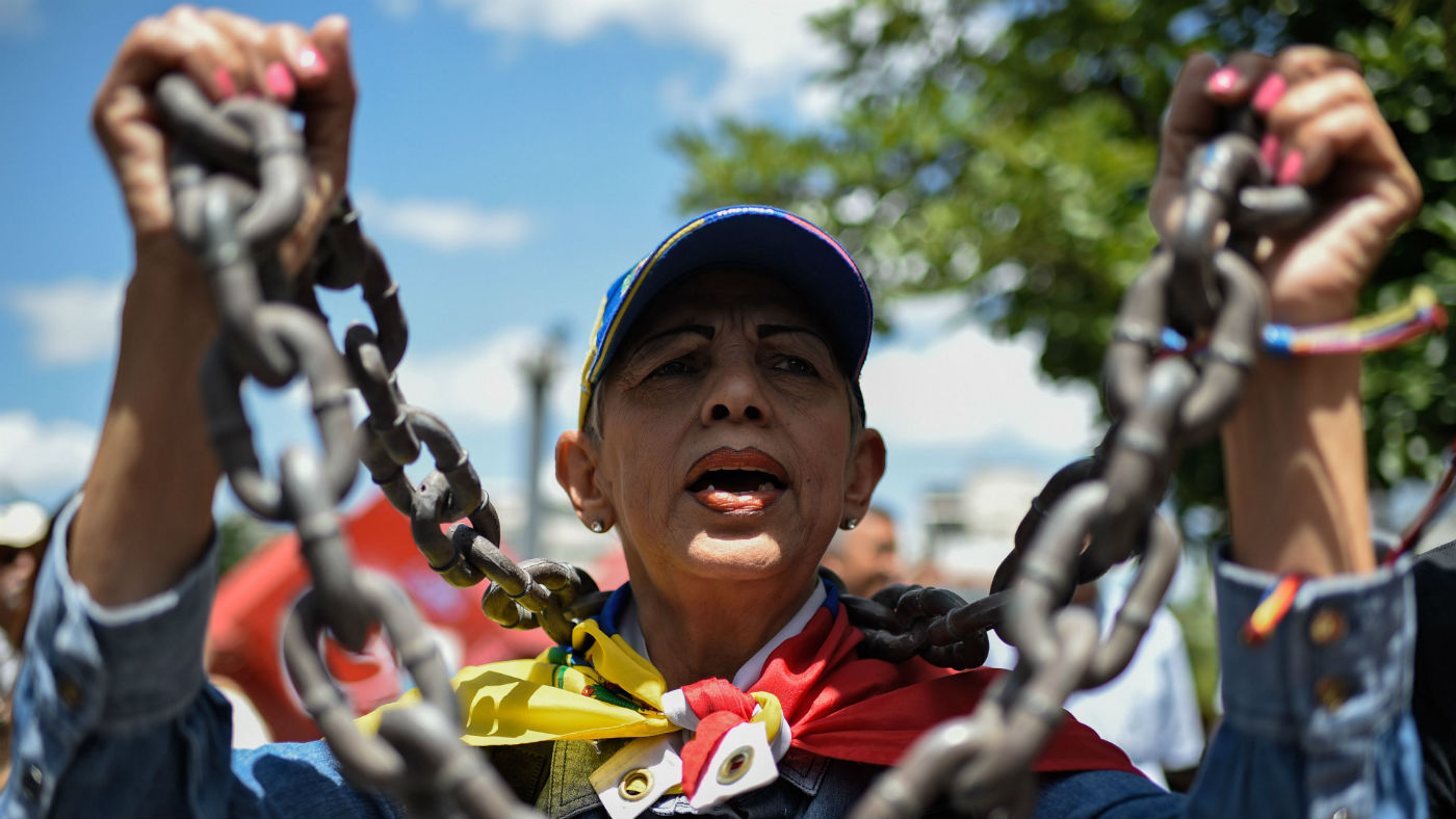 An opposition demonstrator in Caracas last week