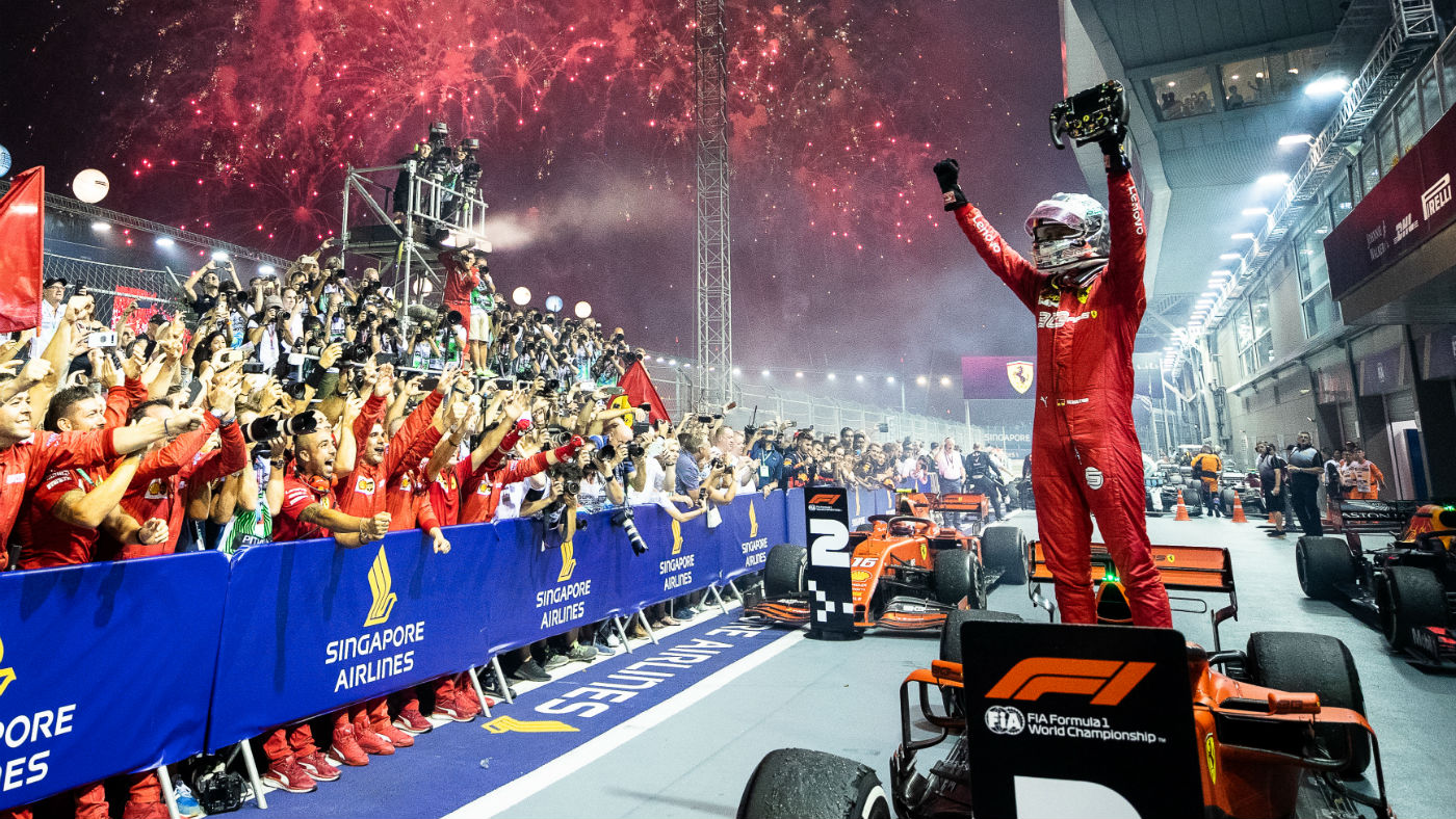 Ferrari’s Sebastian Vettel celebrates his victory at the 2019 F1 Singapore Grand Prix 