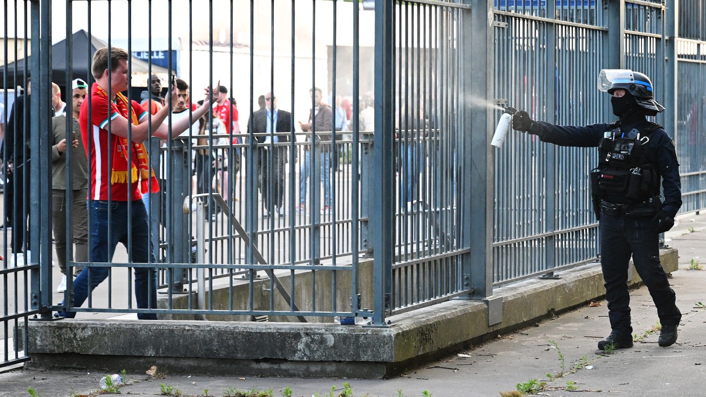 Police sprayed tear gas at Liverpool fans outside the Stade de France