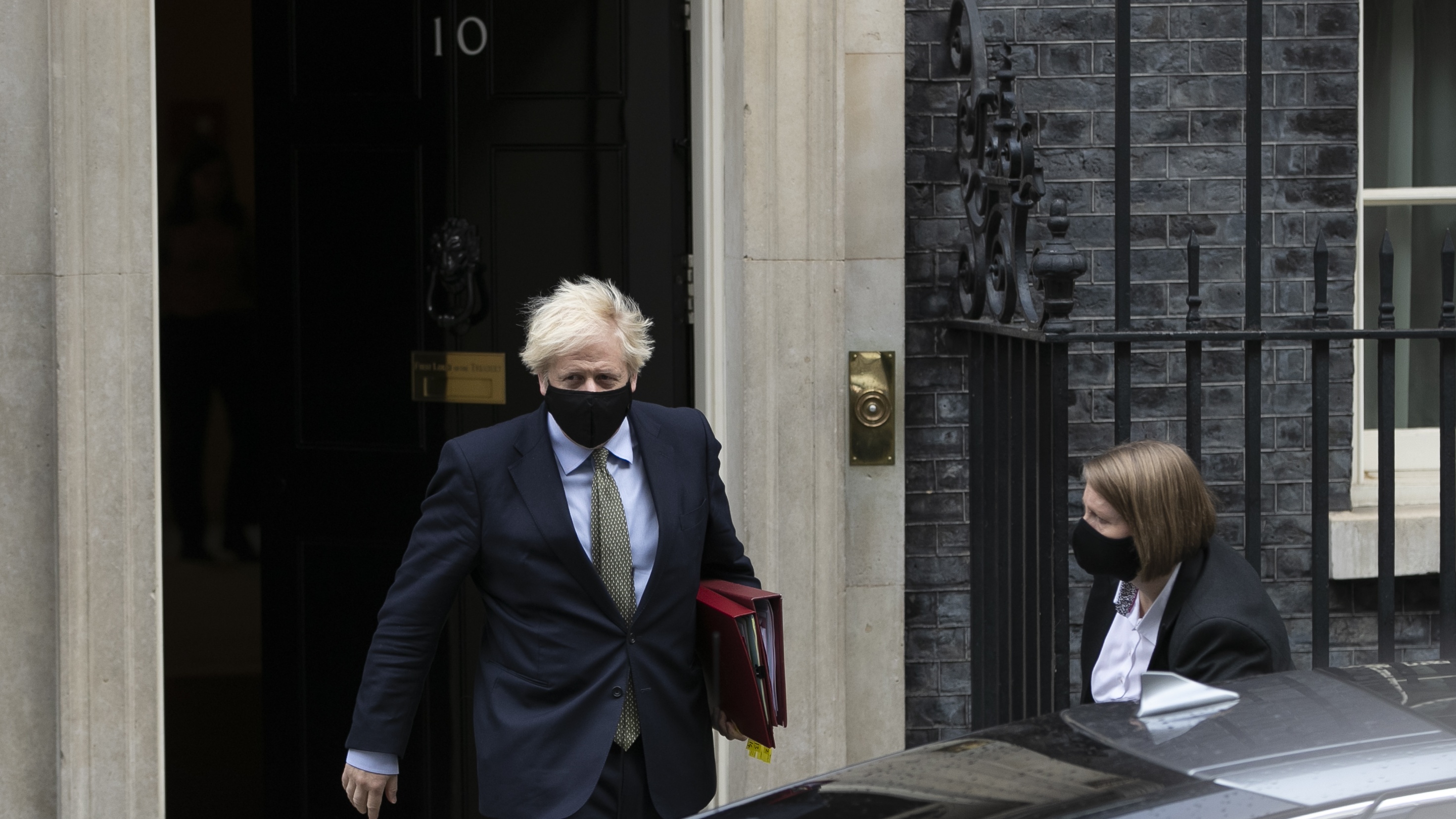 Boris Johnson leaves Downing Street wearing a face mask to attend Prime Ministers&#039; Questions
