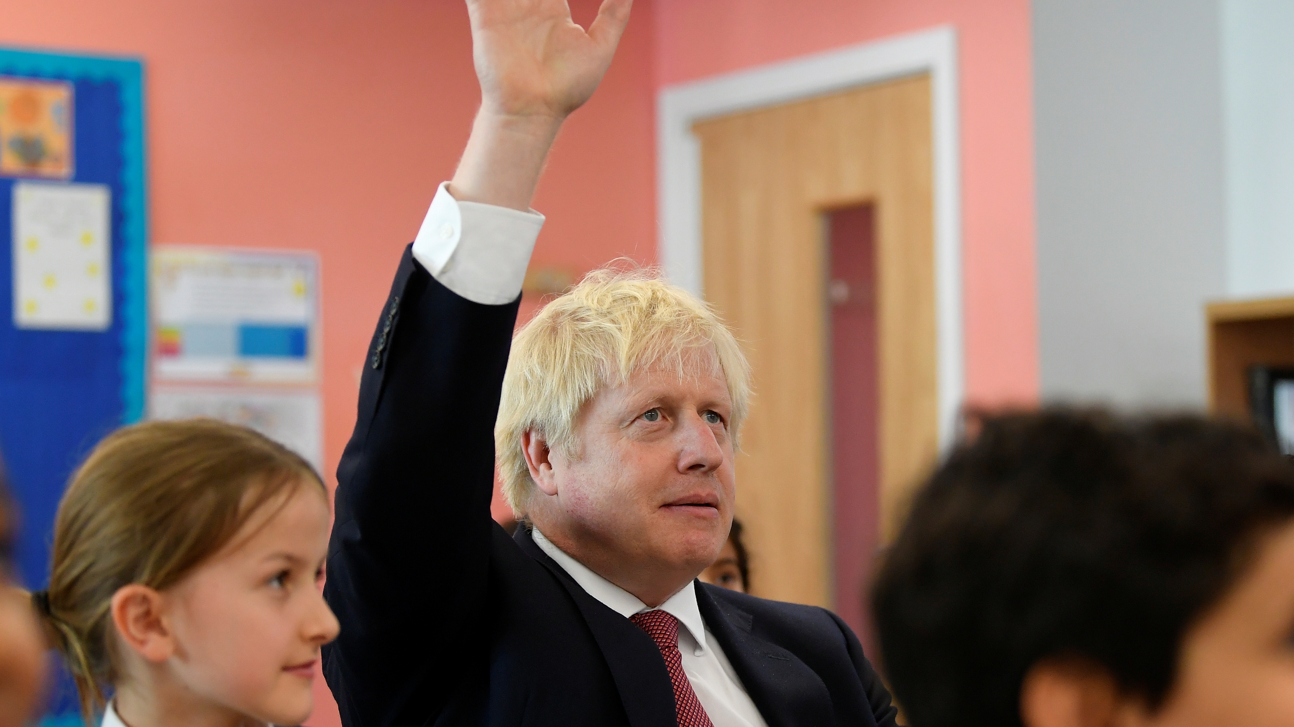 Boris Johnson attends a year six history class with pupils during a visit to Pimlico Primary school.