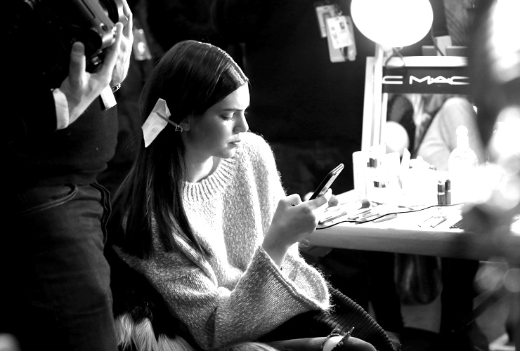 NEW YORK, NY - FEBRUARY 16:Model Kendall Jenner prepares backstage at the Donna Karan New York fashion show during Mercedes-Benz Fashion Week Fall 2015 on February 16, 2015 in New York City.(