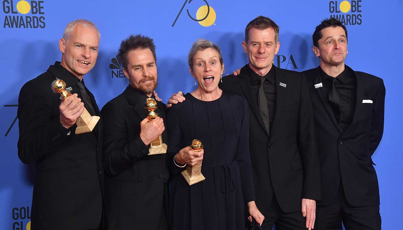 Cast of Three Billboards Outside Ebbing, Missouri pose with the award for best picture