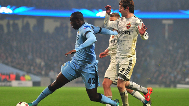 Manchester City&#039;s Yaya Toure vies with CSKA Moscow&#039;s Mario Fernandes