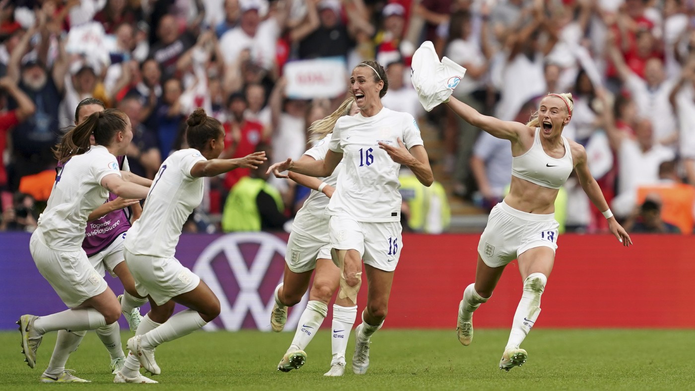 Chloe Kelly celebrates her winning goal for England   