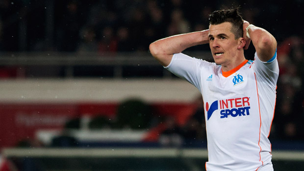 PARIS, FRANCE - FEBRUARY 24:Joey Barton of Marseille reacts during the Ligue 1 match between Paris Saint-Germain FC and Olympique de Marseille at Parc des Princes on February 24, 2013 in Pari