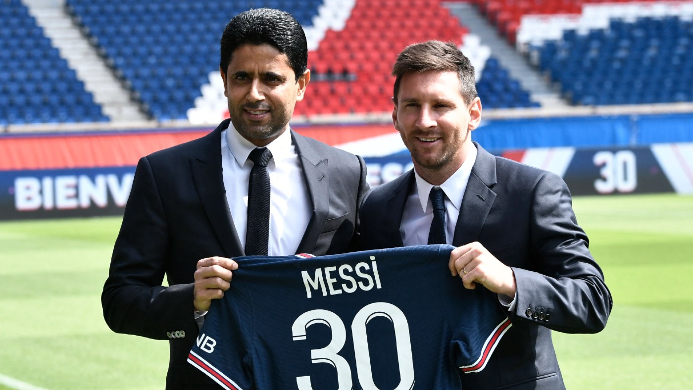 PSG president Nasser Al-Khelaifi and Lionel Messi  