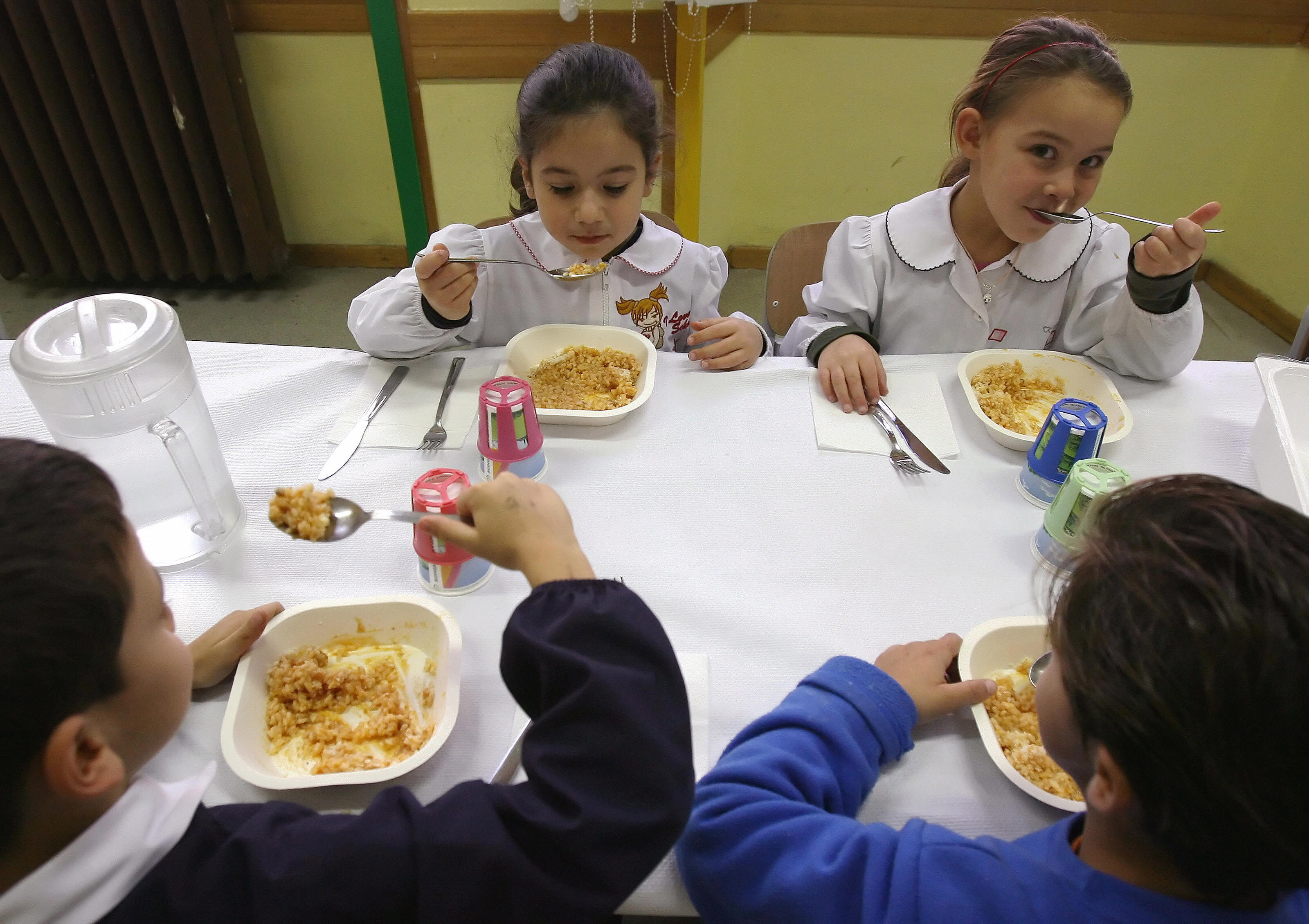 Kids take their school meals