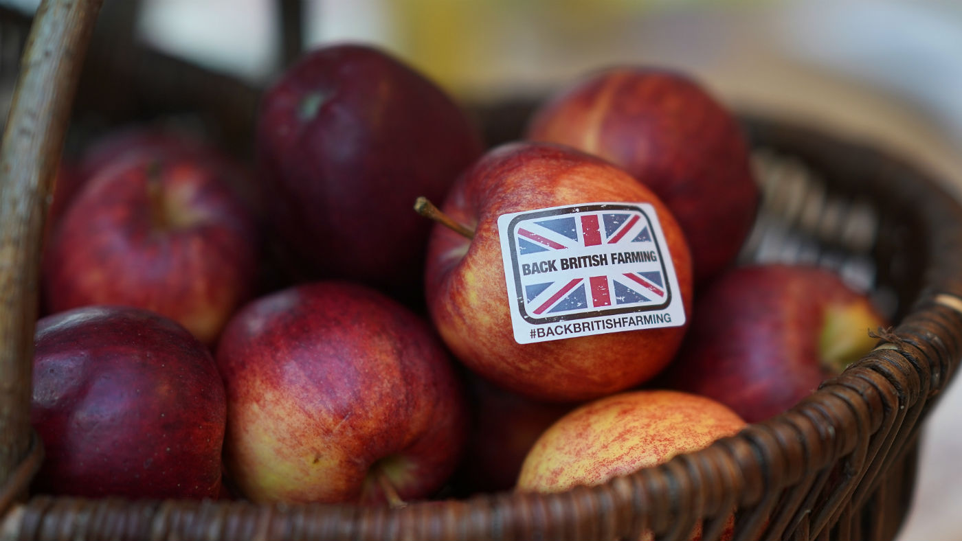 A &#039;Back British Farming&#039; sticker adorns an apple during the National Farmers Union annual conference earlier this year