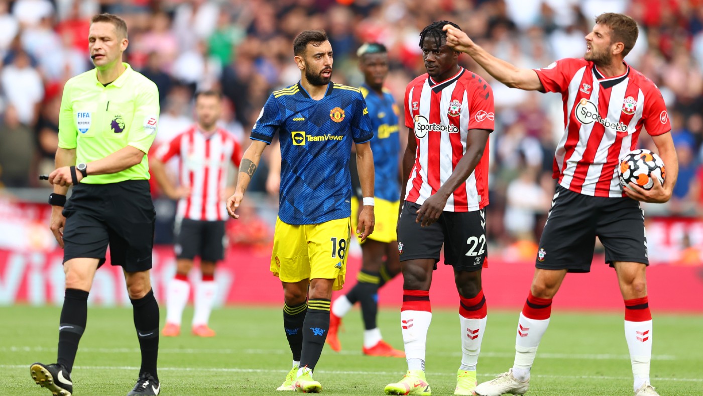 Man Utd’s Bruno Fernandes confronts Southampton’s Jack Stephens  