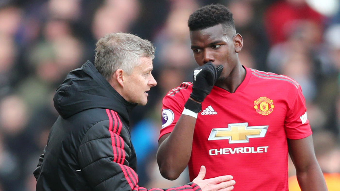 Manchester United manager Ole Gunnar Solskjaer and French midfielder Paul Pogba