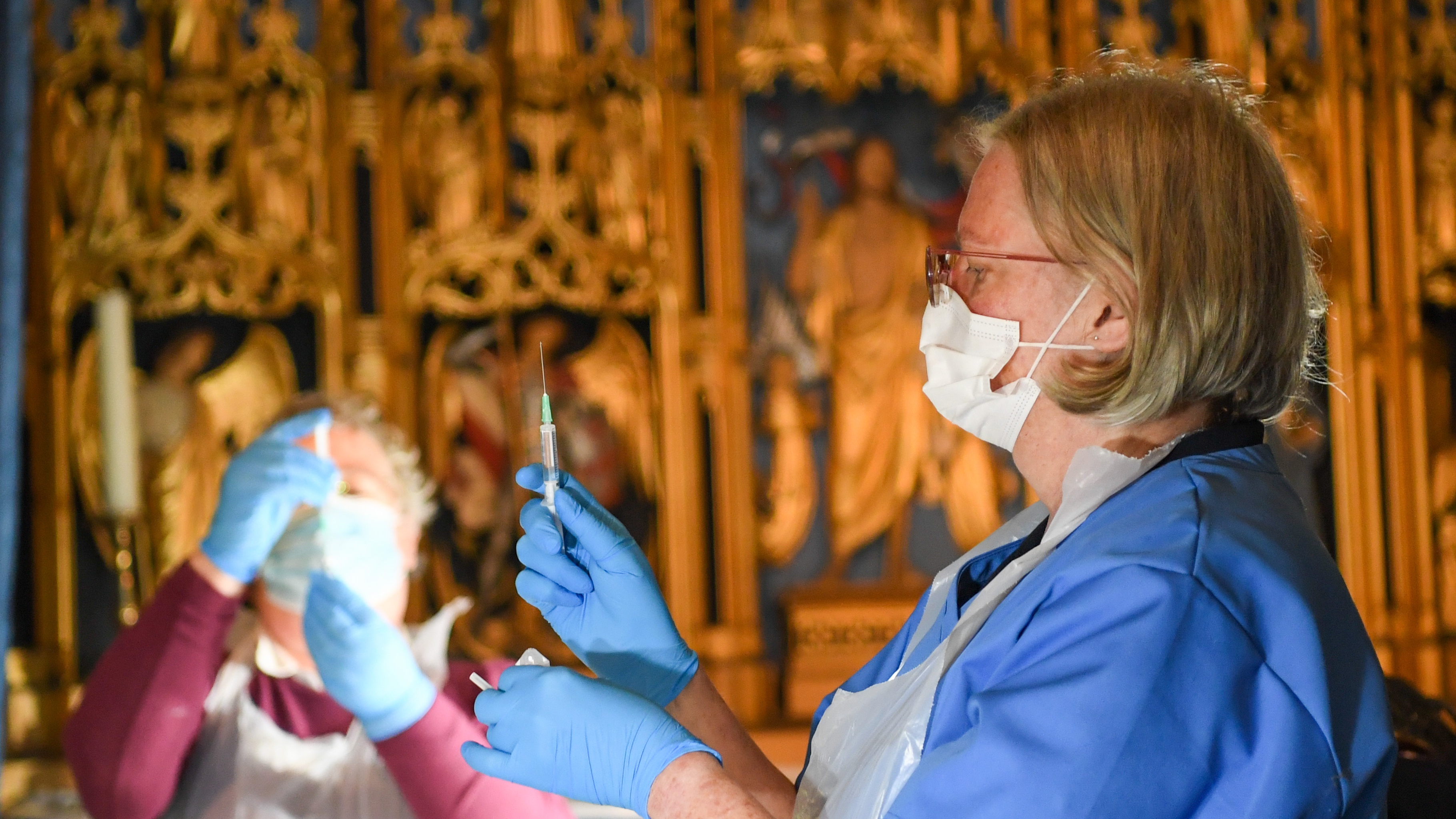 Staff prepare the Pfizer Covid vaccine at Salisbury Cathedral 