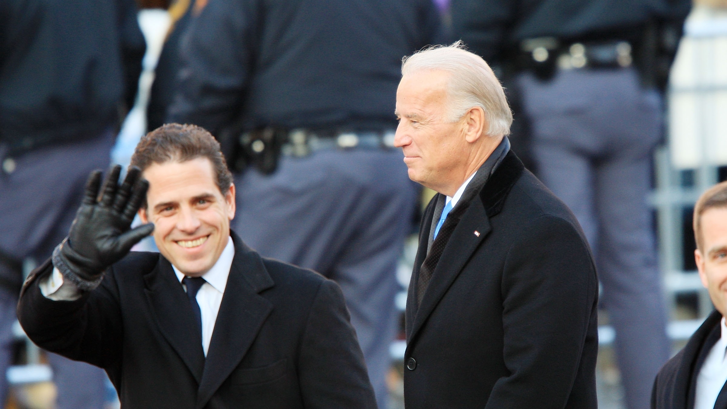 Hunter Biden and Joe Biden walking together.