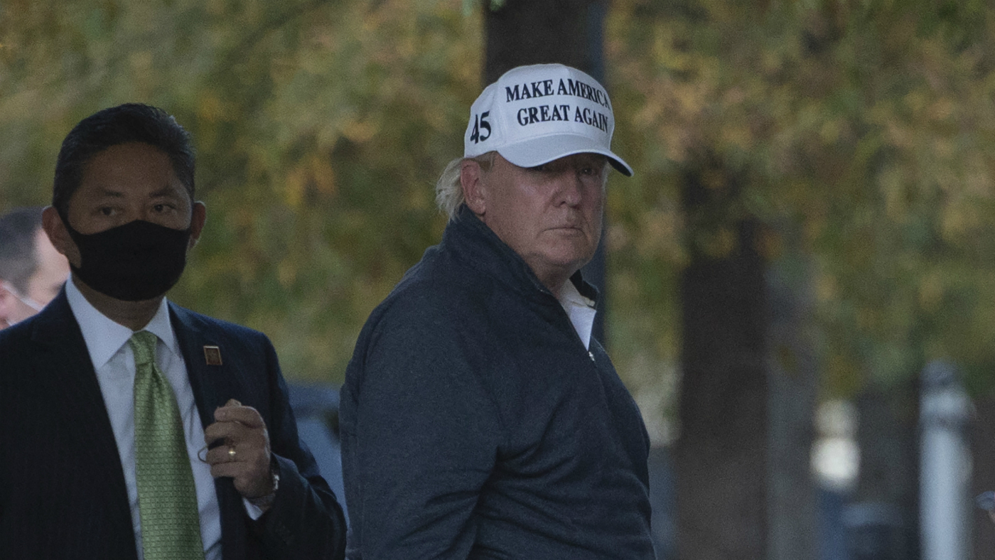 Donald Trump arrives back at the White House after playing golf on Saturday.