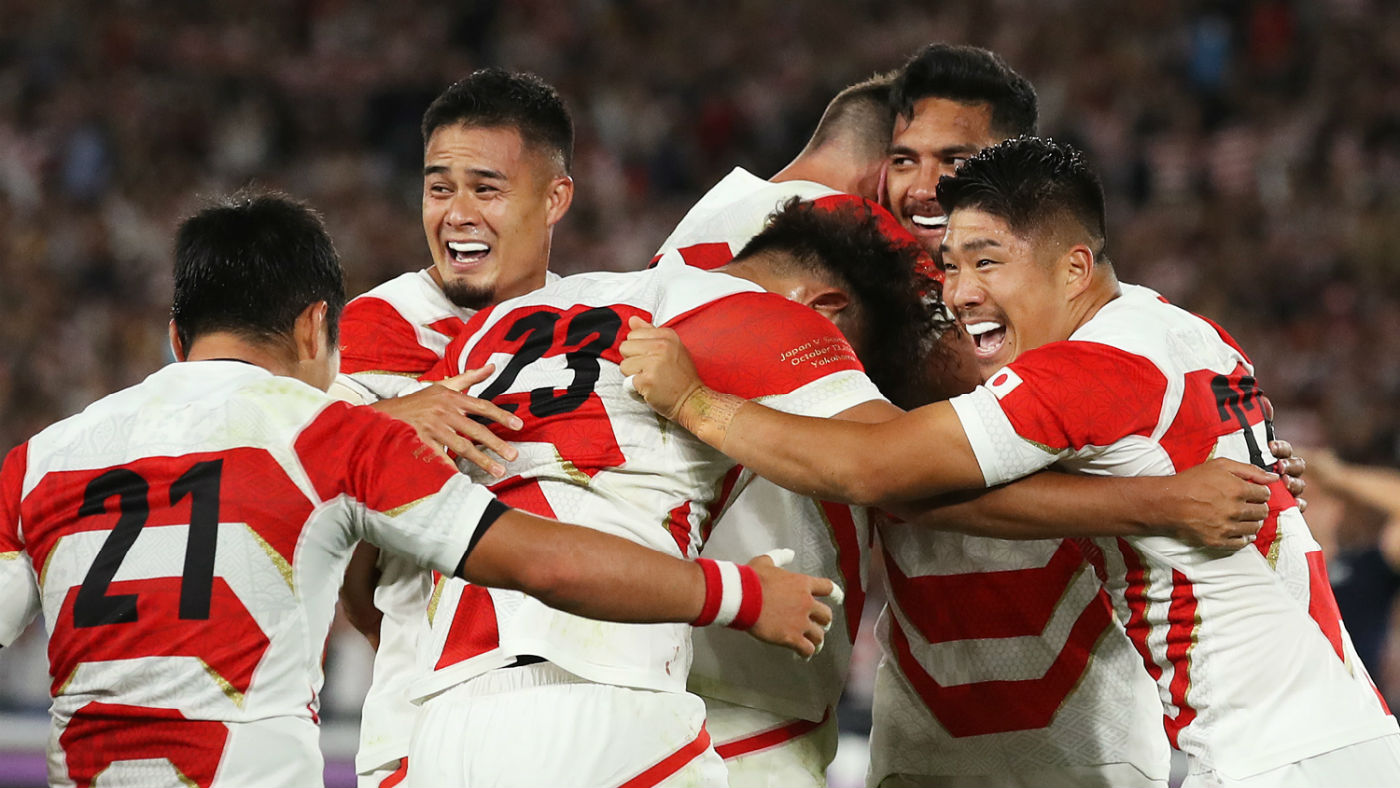 Japan celebrate their victory over Scotland at the Rugby World Cup 