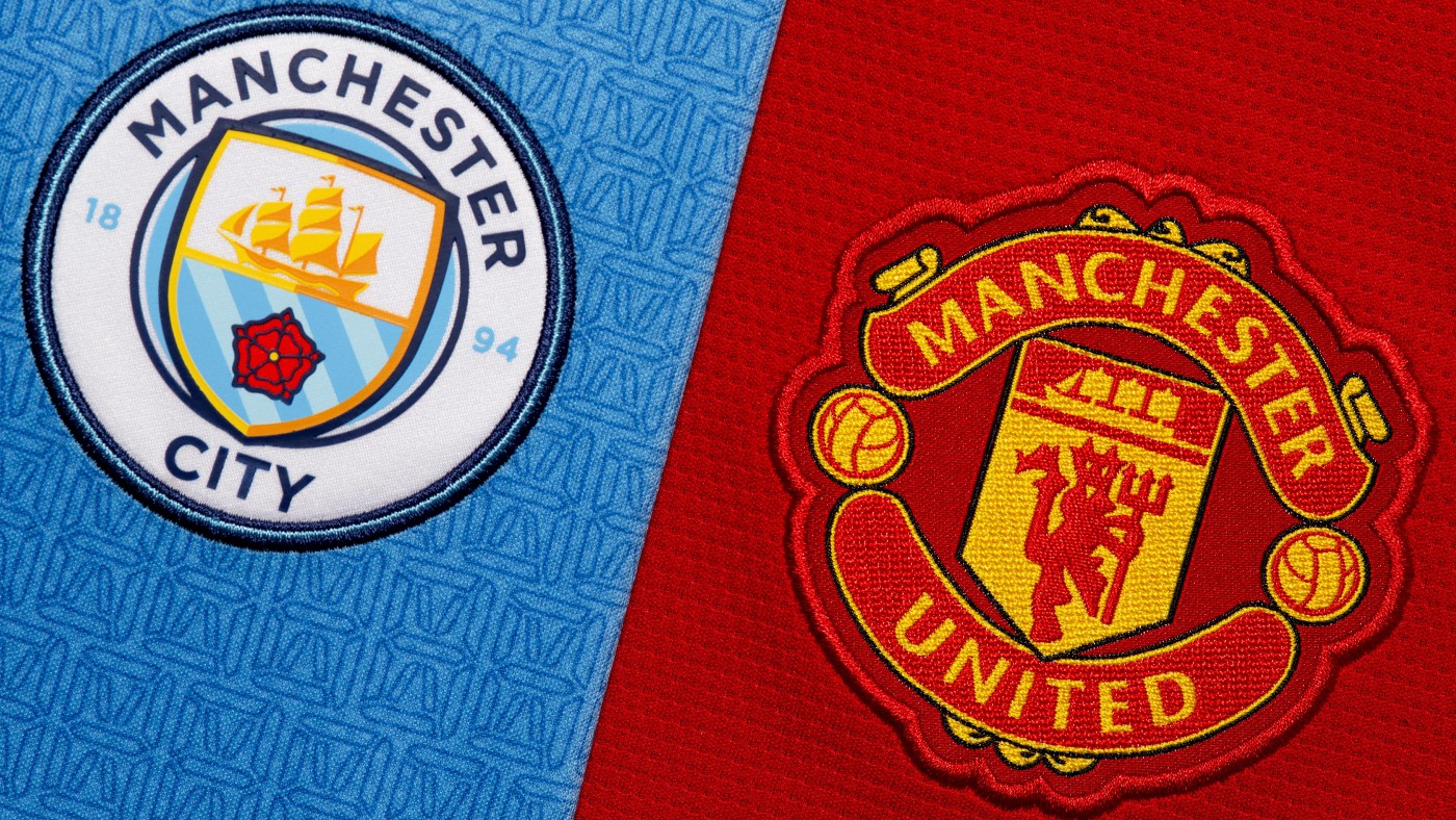 The Manchester City and Manchester United club crests 