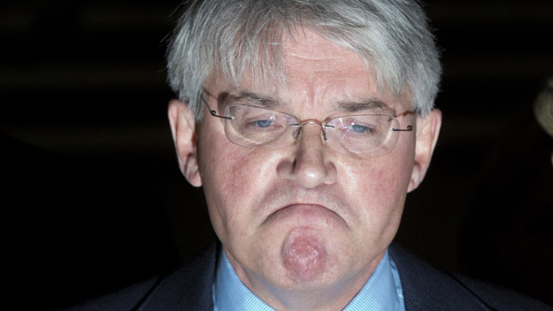 Former cabinet minister and Conservative MP Andrew Mitchell talks to the media after the court ruling.