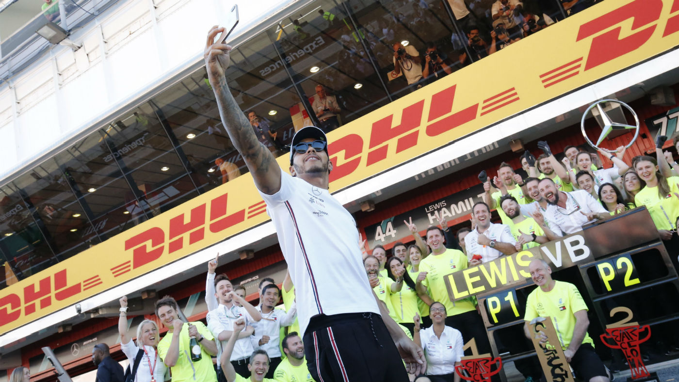 F1 Spanish GP winner Lewis Hamilton takes a selfie with the Mercedes team