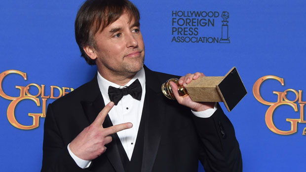 Richard Linklater poses with the award for best director