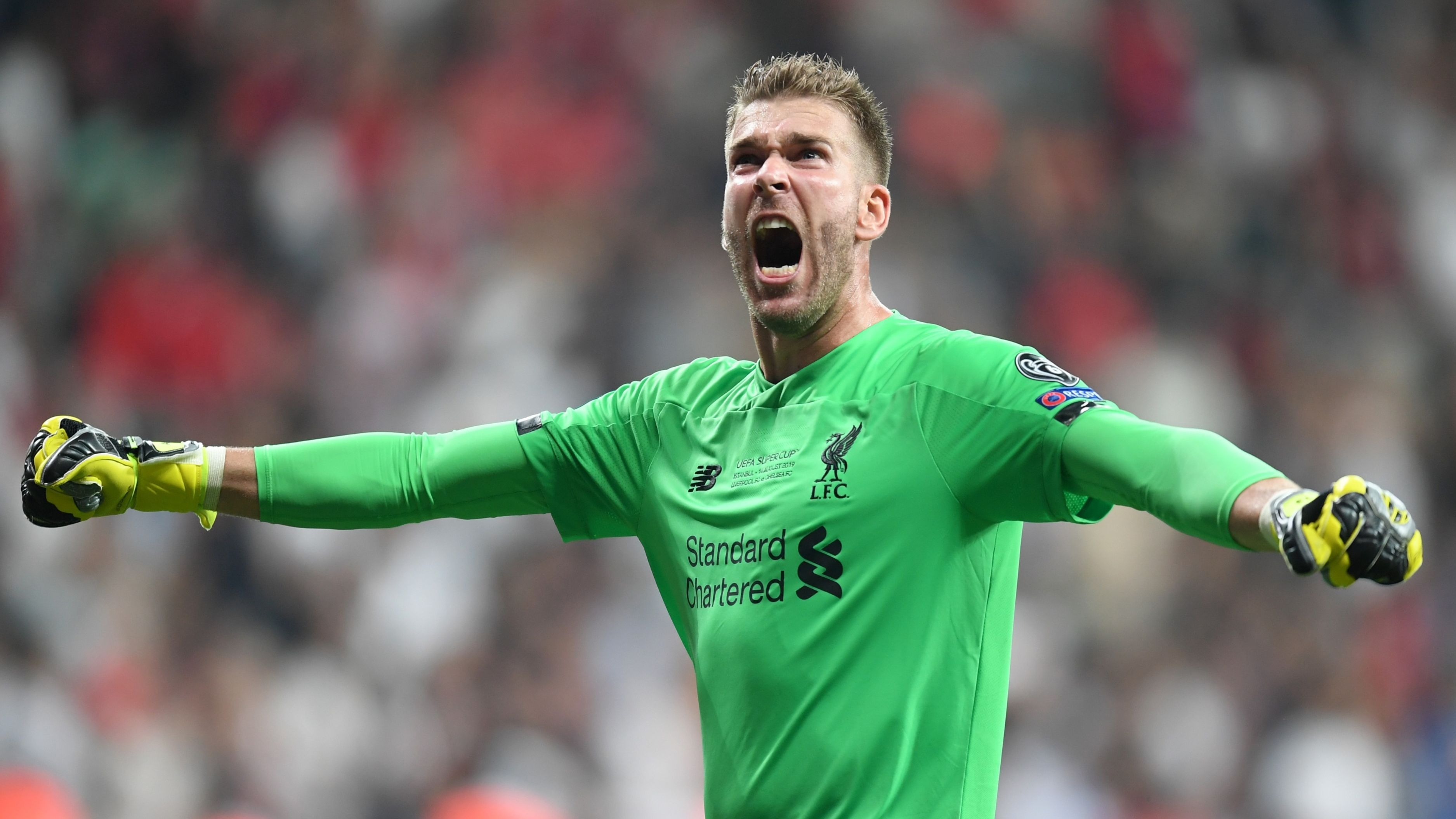 Liverpool goalkeeper Adrian celebrates after winning the Uefa Super Cup