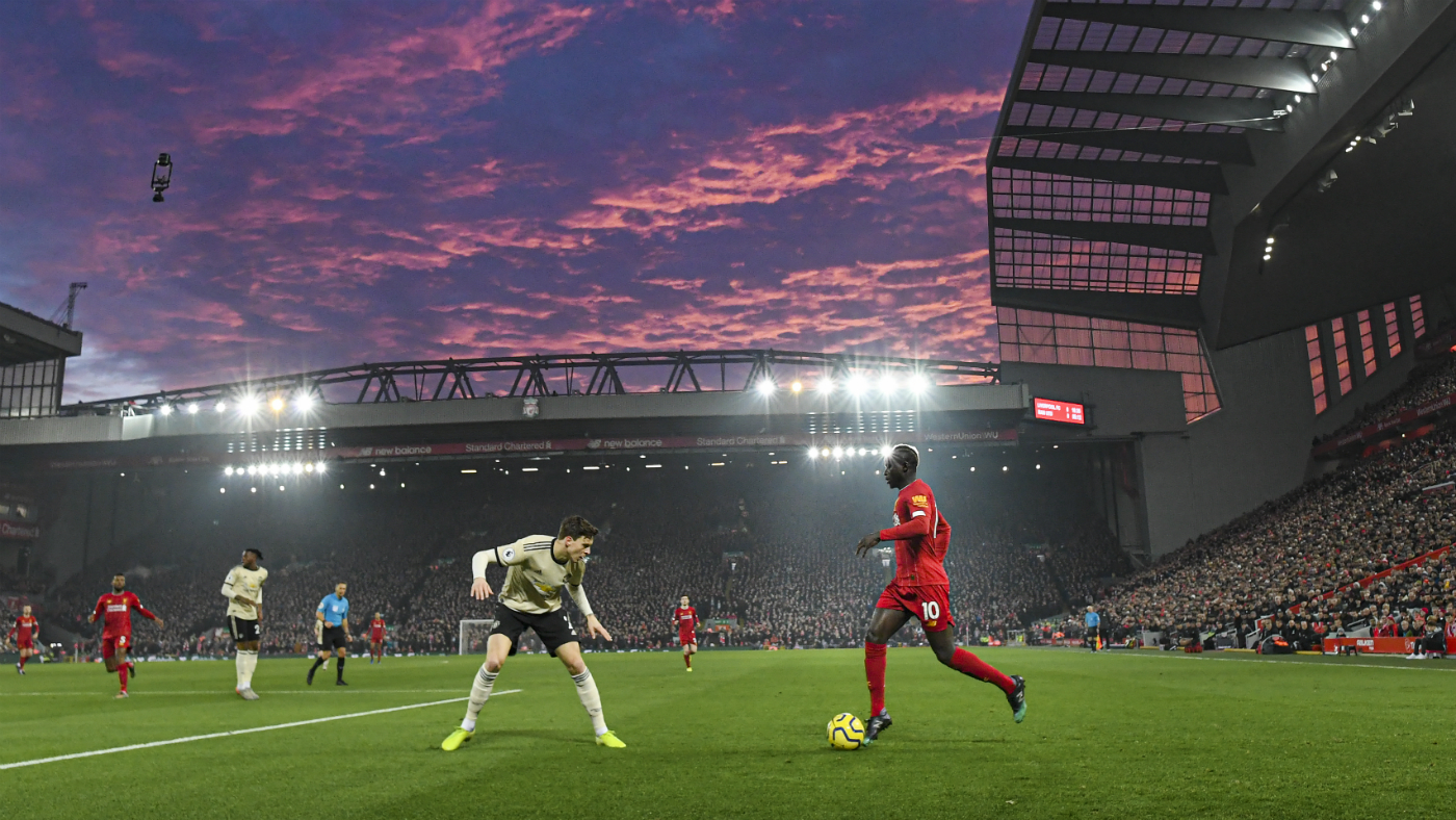 Liverpool take on Manchester United in a Premier League match.
