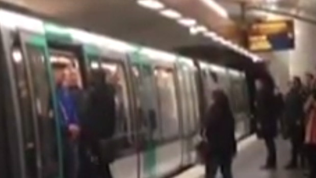 Chelsea fans push a man off train 