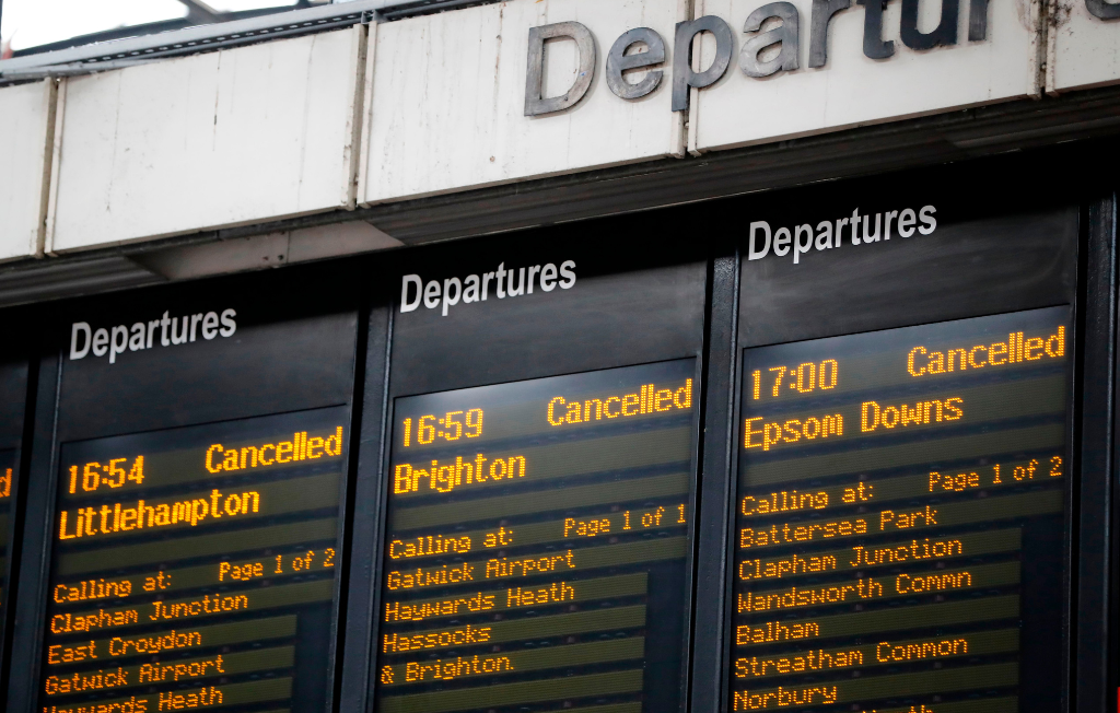 Departure boards show cancelled train services