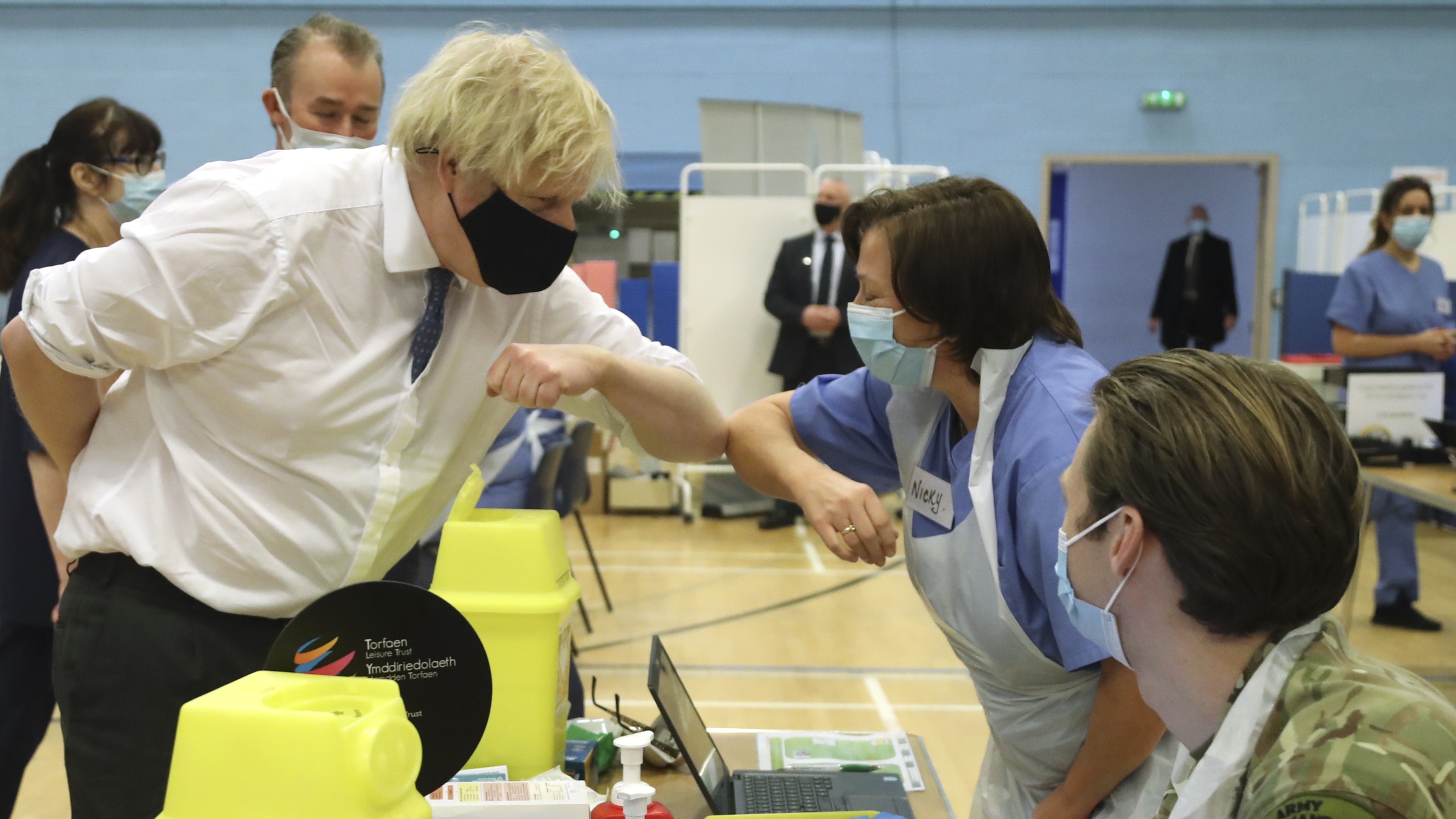 Boris Johnson visits a vaccination centre in Cwmbran, Wales.