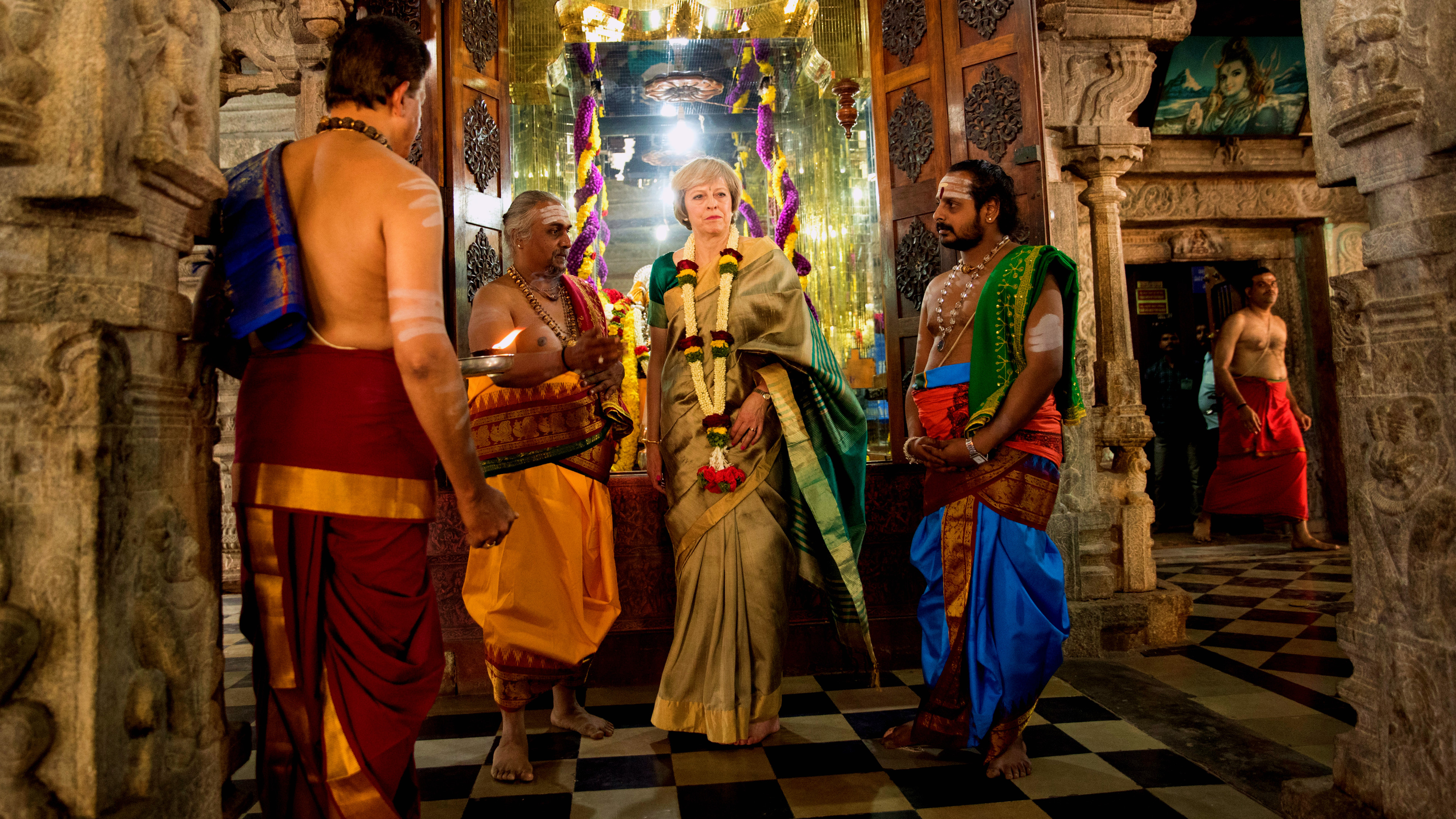 Theresa May is welcomed to the Sri Someshwara Temple in Bangalore during her two-day trade mission to India 