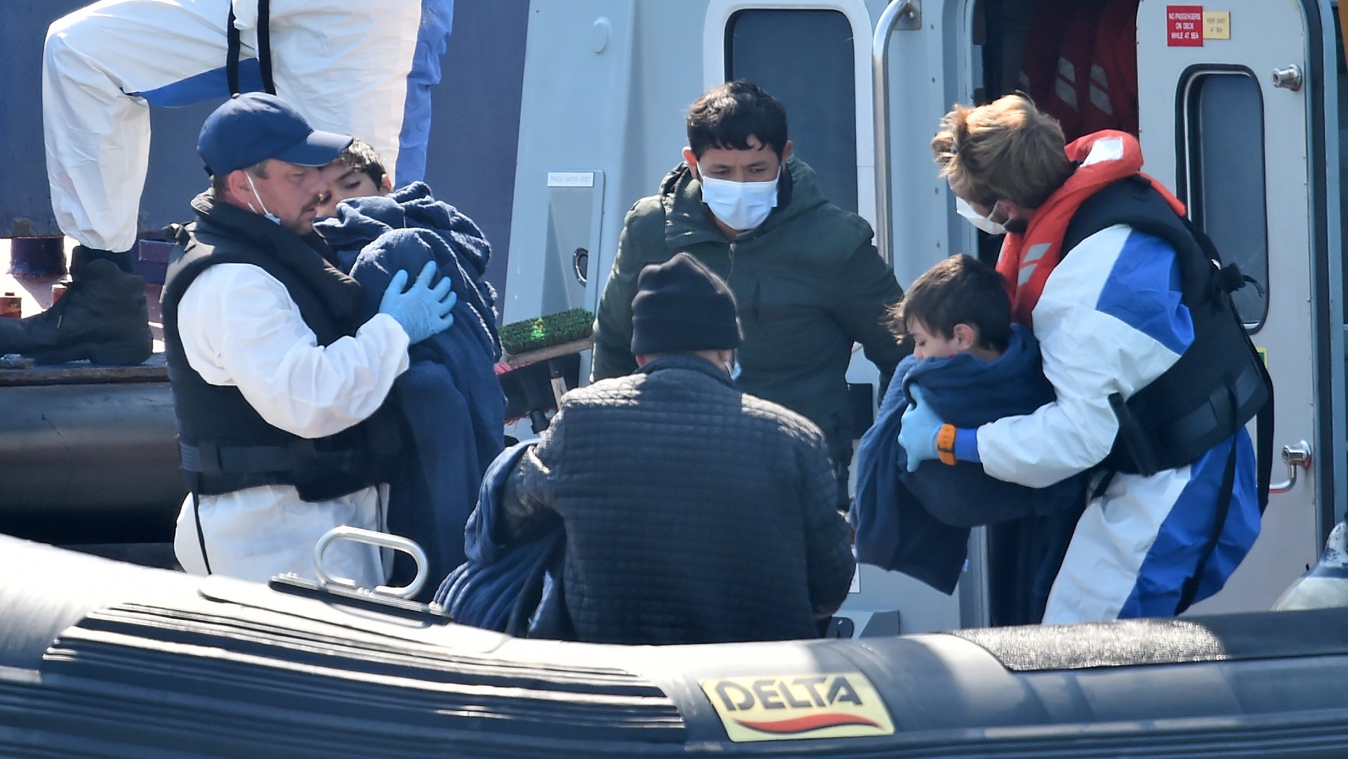Border Force staff help refugees in the port of Dover 