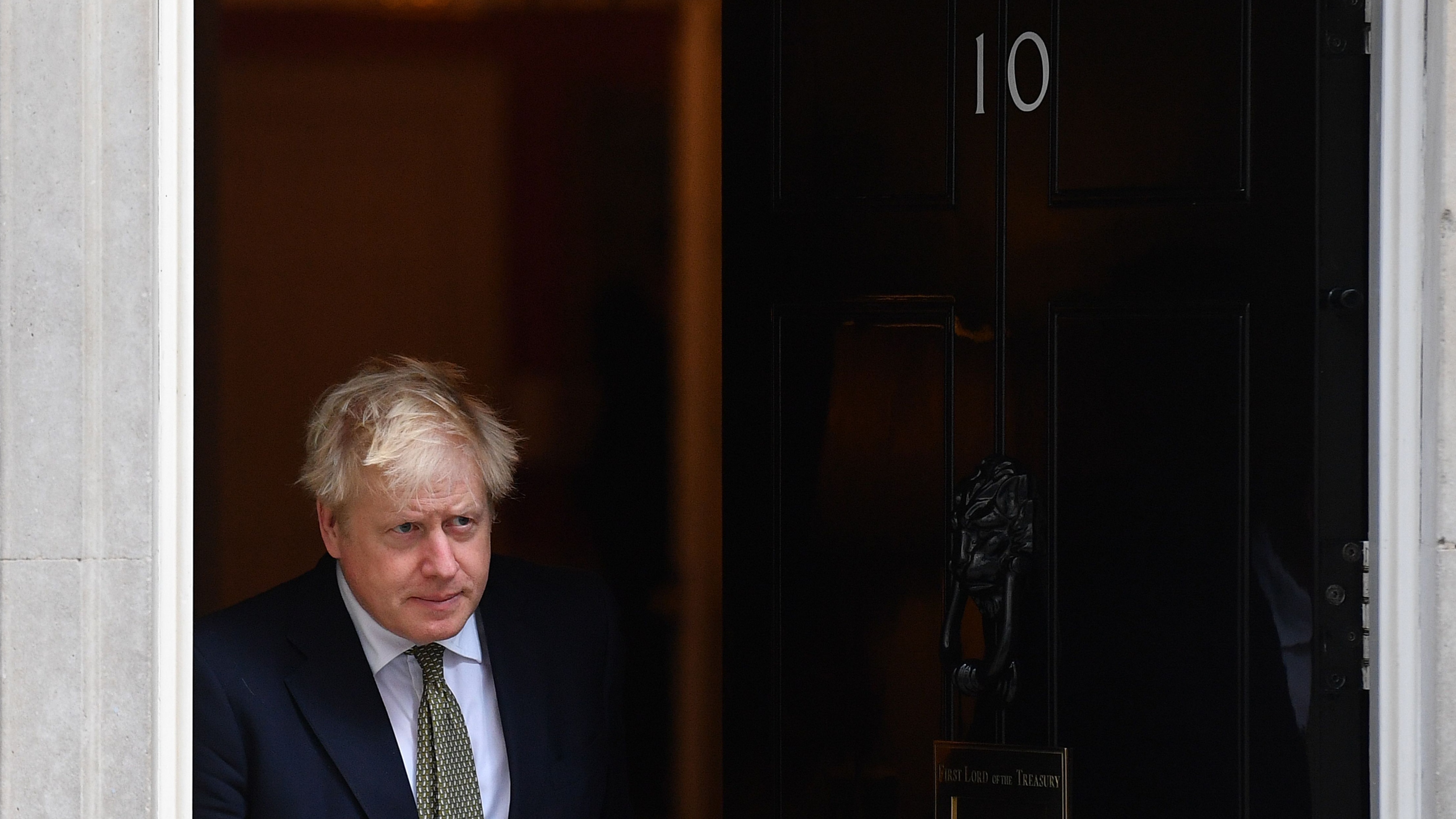 Boris Johnson emerges from 10 Downing Street